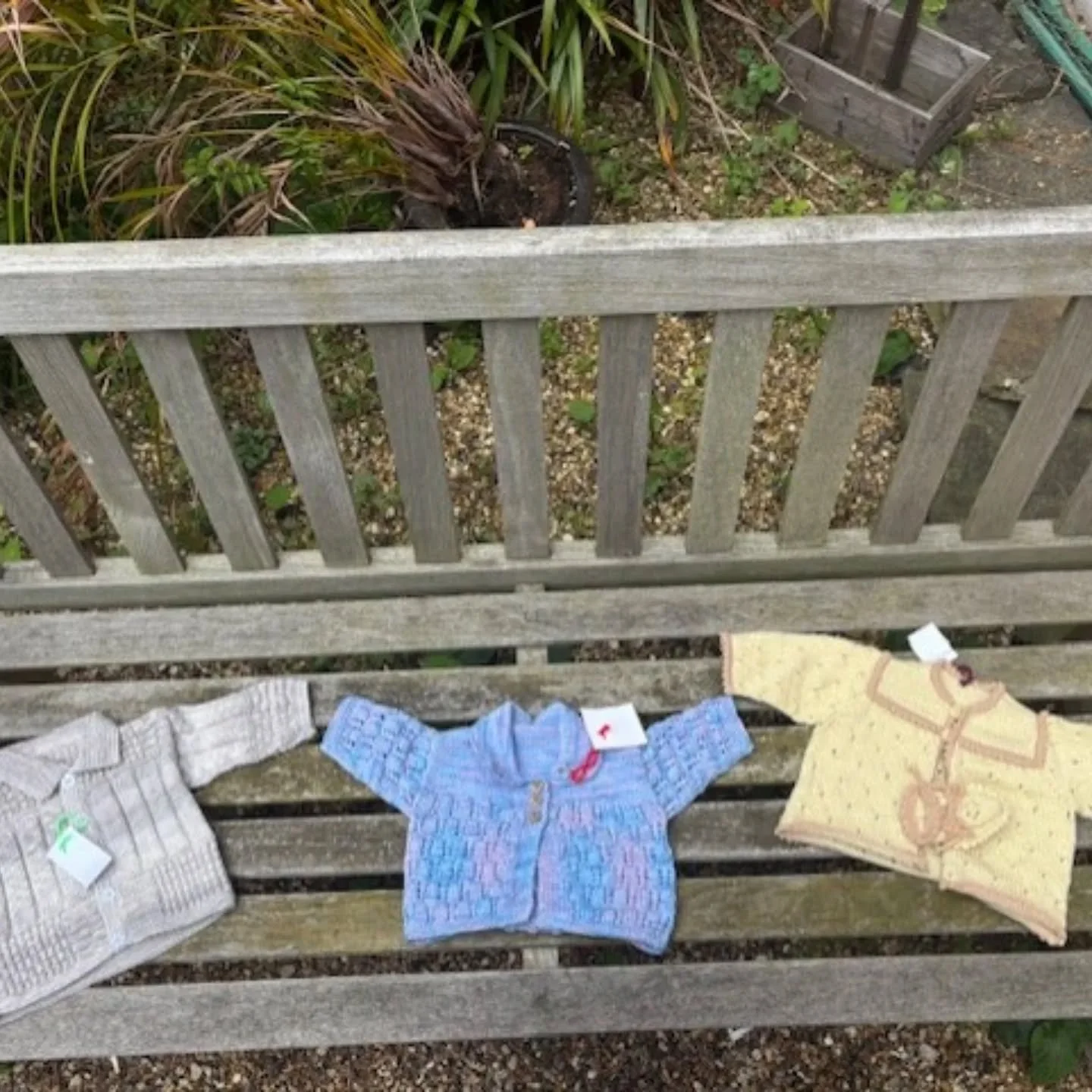 We've had a lot of recent requests for baby jumpers and cardigans so these lovely matinee jackets are just perfect. They were sent to us anonymously by a Knitter we think must enjoy pattern and texture. 

Thank you, Crafter!

These are our Knit of th