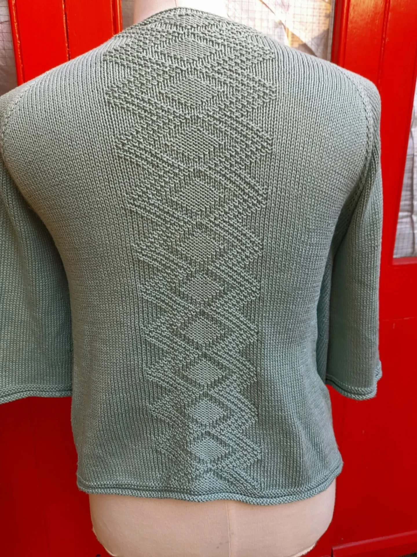 Judith in Wokingham has sent us these lovely adult sized cardigans. The stitch patterns are so clever and must have needed a lot of skill and so much counting!  And we do like a daisy button!

Thank you, Judith. These are our Knit of the Day!

#knito