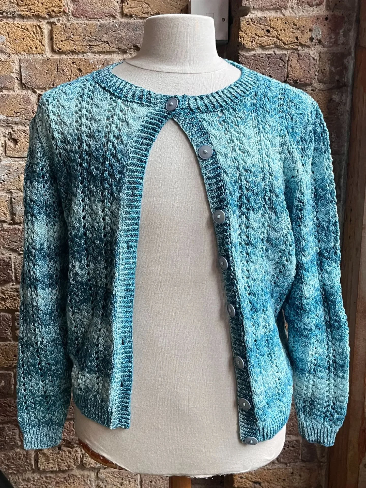 This very stylish cardigan has been sent to us anonymously. We love the cabling and lacy details and the shades of blue waving through the garment. Such a lot of counting!

Thank you, Knitters. 

This is our Knit of the Day!

#knitoftheday #handknit 