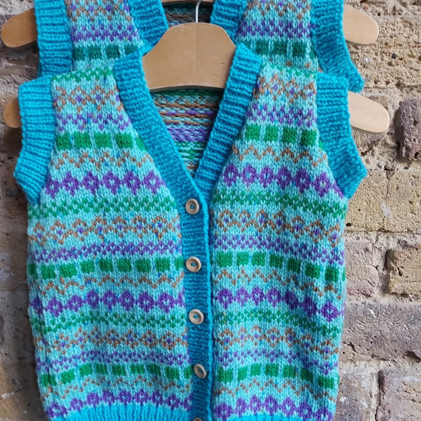 We love colourful jumpers here at KFP HQ and these lovely examples have definitely hit the sweet spot.  The attention to detail is fantastic  and we like the way the knitter has put bright highlights to all the cuffs on the stripy jumper.  The strand