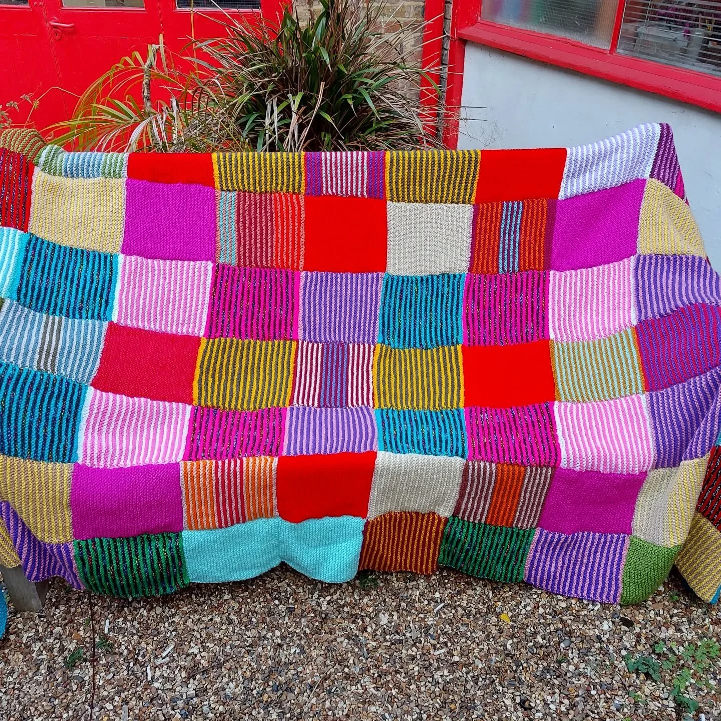The Knitwits in Didcot have a good eye for bright colours and have sentbus this huge blanket. The use of stripes within each square gives it lots of added interest and is a great design choice. 

Thank you, Knitwits. This is our Knit of the Day!

#kn
