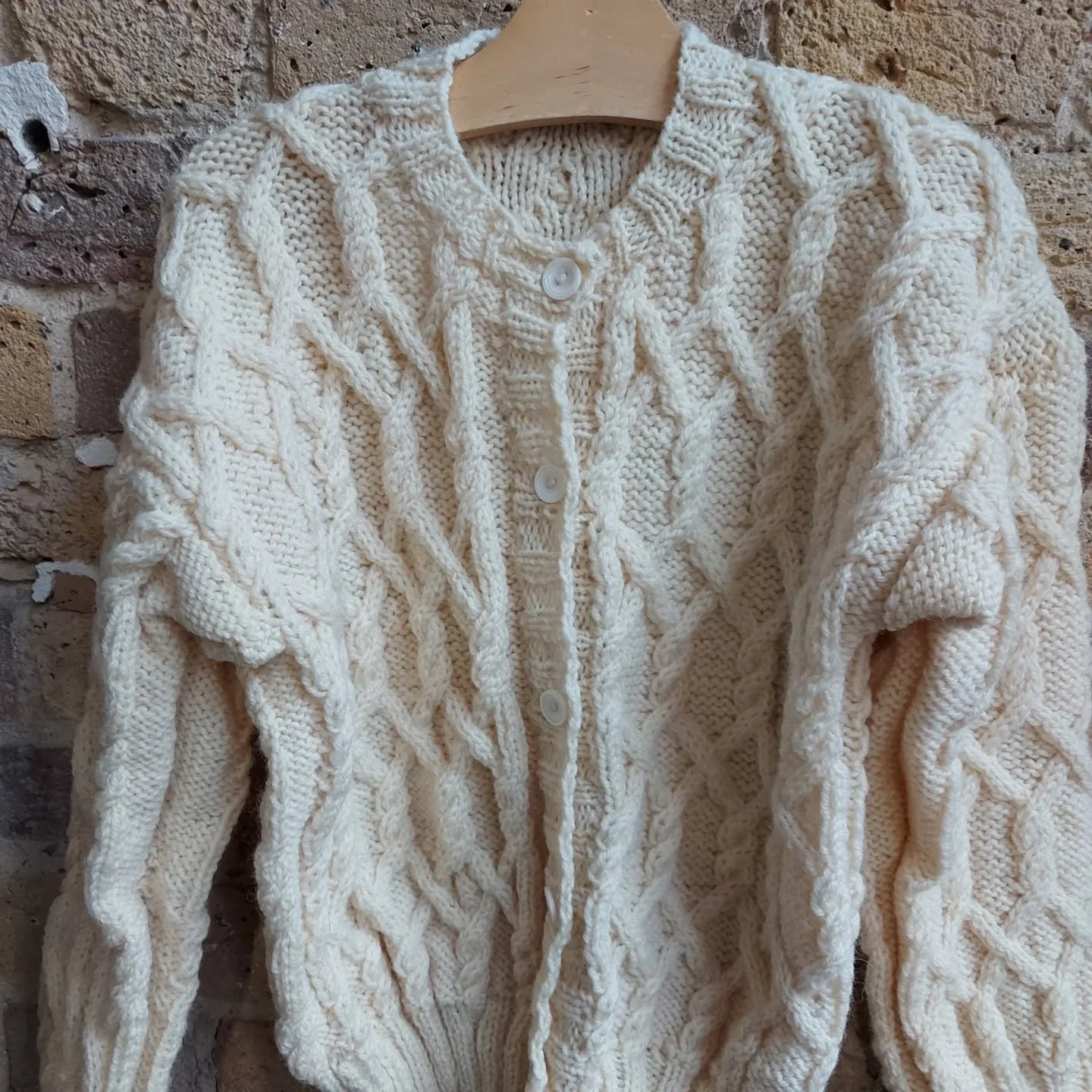 Pat in Southampton has sent us these stylish children's cardigans in a batch of lovely yarny things. We really like the chunky cable design in the aran style cardigan and the lacy sleeves on the pink lumper. There's lots of textures to add interest a