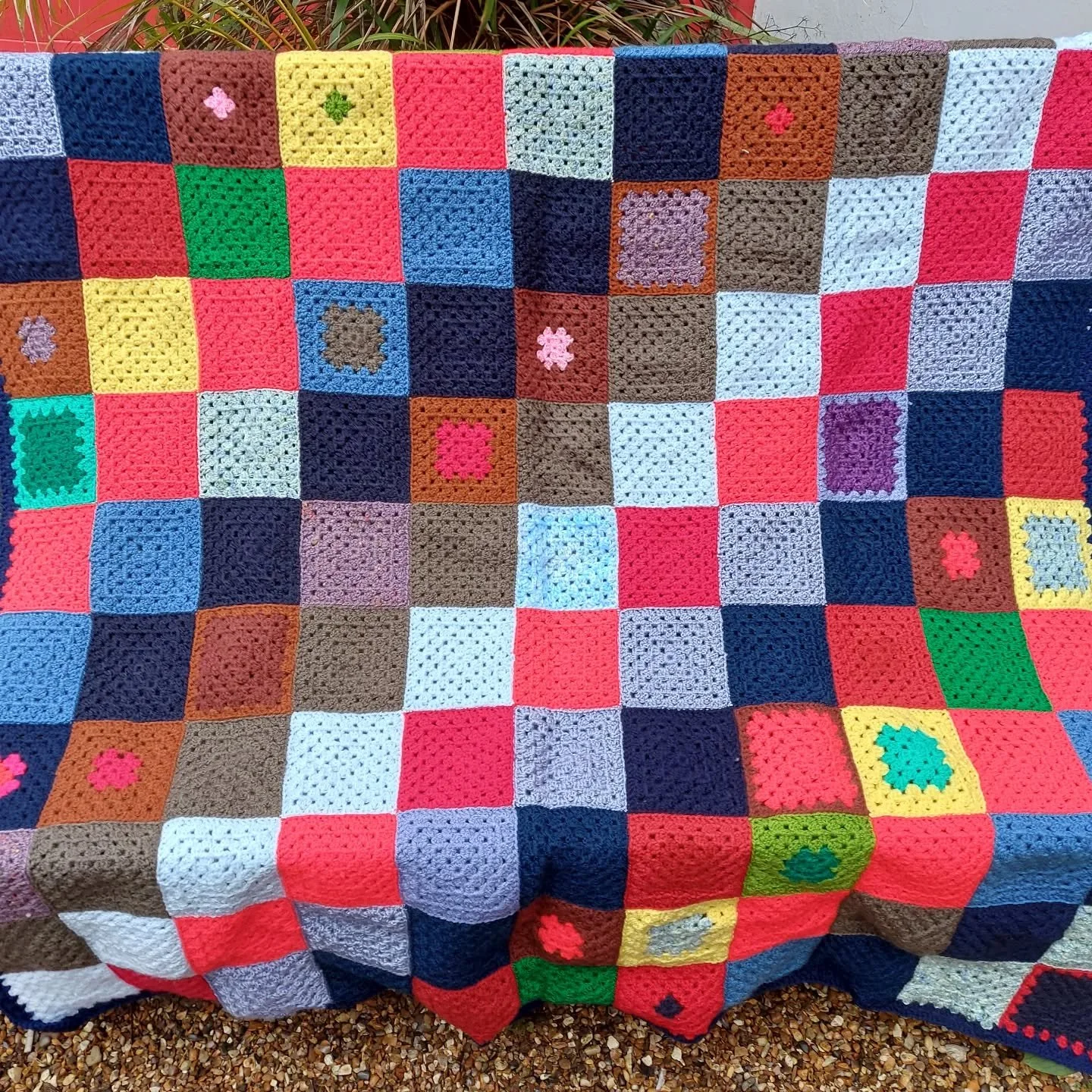 Look at this amazing blanket sent to us by J in Braemar.  We love the design and the colour choices.  It's another wonderful example of the tremendous variety it's possible to achieve with granny squares. 

Thank you, J.  This is our Crochet of the D