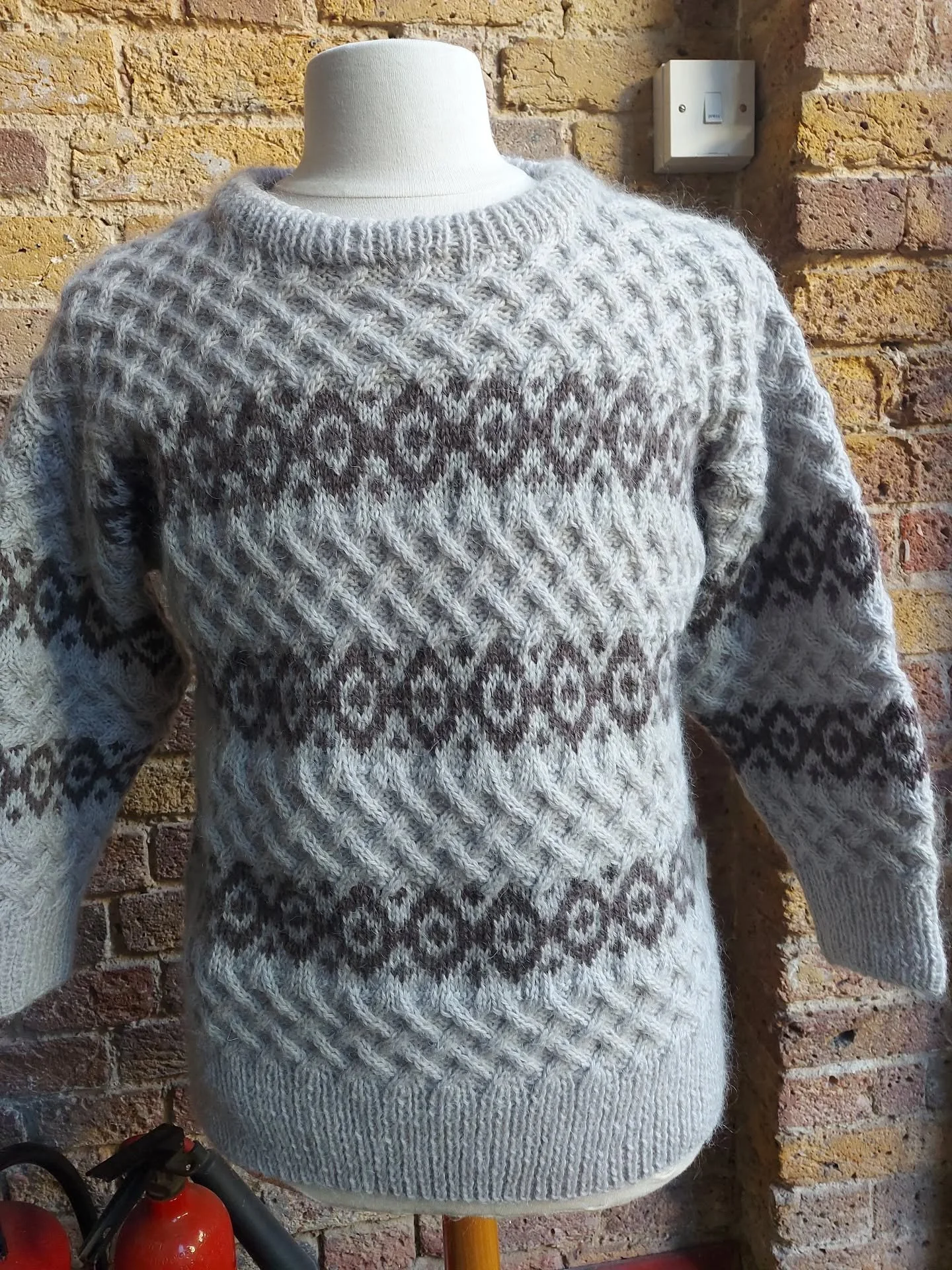 Ann in Kilmarnock has sent us this beautiful adult sized jumper.  What a treat to have both cable designs and stranded colourwork in the same garment. It will be so cosy and warm. 

Thank you, Ann. This is our Knit of the Day!

#knitoftheday #handmad