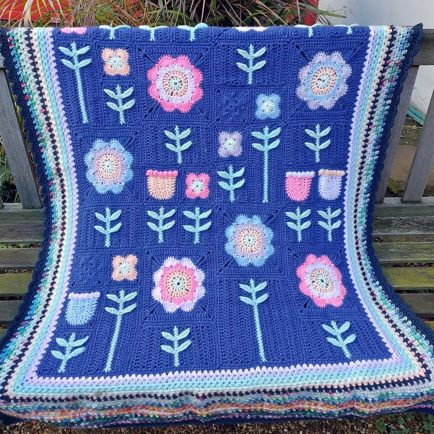 Heather has sent us this joyful flowery blanket. We love it, and it is bound to bring a smile wherever it goes. It is a great design, executed with tremendous skill.

Thank you , Heather.  This is our Crochet of the Day!

#crochetoftheday #handmade #