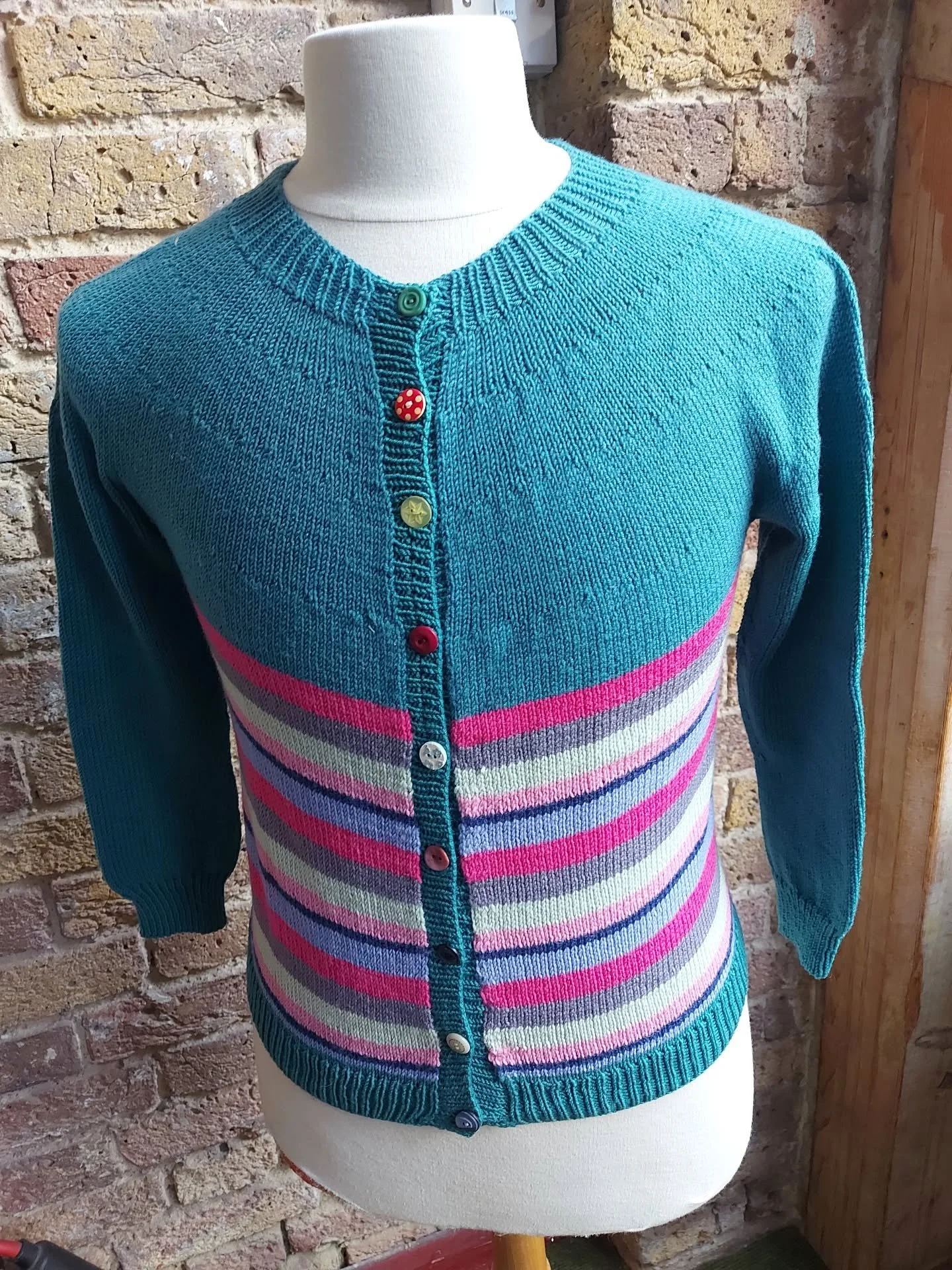 Val in Honiton has sent us this jolly adult sized cardigan. We especially like the mixture of buttons and the shaping around the shoulders. It will add style and colour to any wardrobe. 

Thank you, Val. This is our Knit of the Day!

#knitoftheday #h