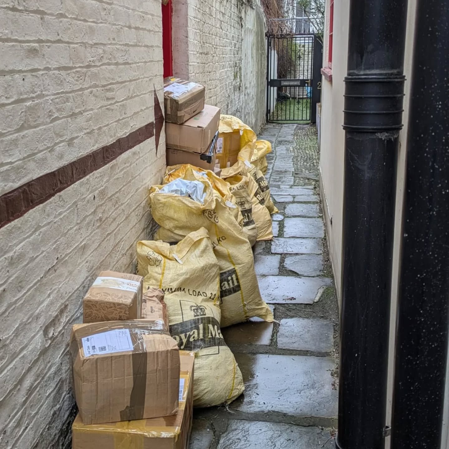 This was the sight that greeted David when he arrived at KFP HQ this morning!  It's our first Royal Mail delivery since before Christmas, so a lot of parcels must have built up at the sorting office.  We're not the easiest place to deliver to as Back