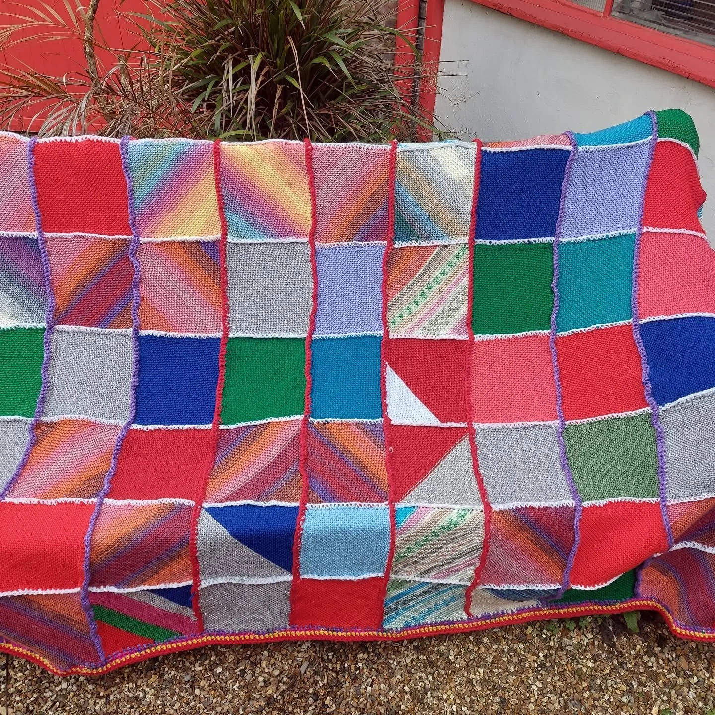 The Crafty Ladies at St Mary's Church Dorchester have sent us some great blankets, and this colourful one is huge, and it's got a crocheted border all the way around. We do like a border!

Thank you, Ladies. This is our Knit of the Day!

#knitoftheda