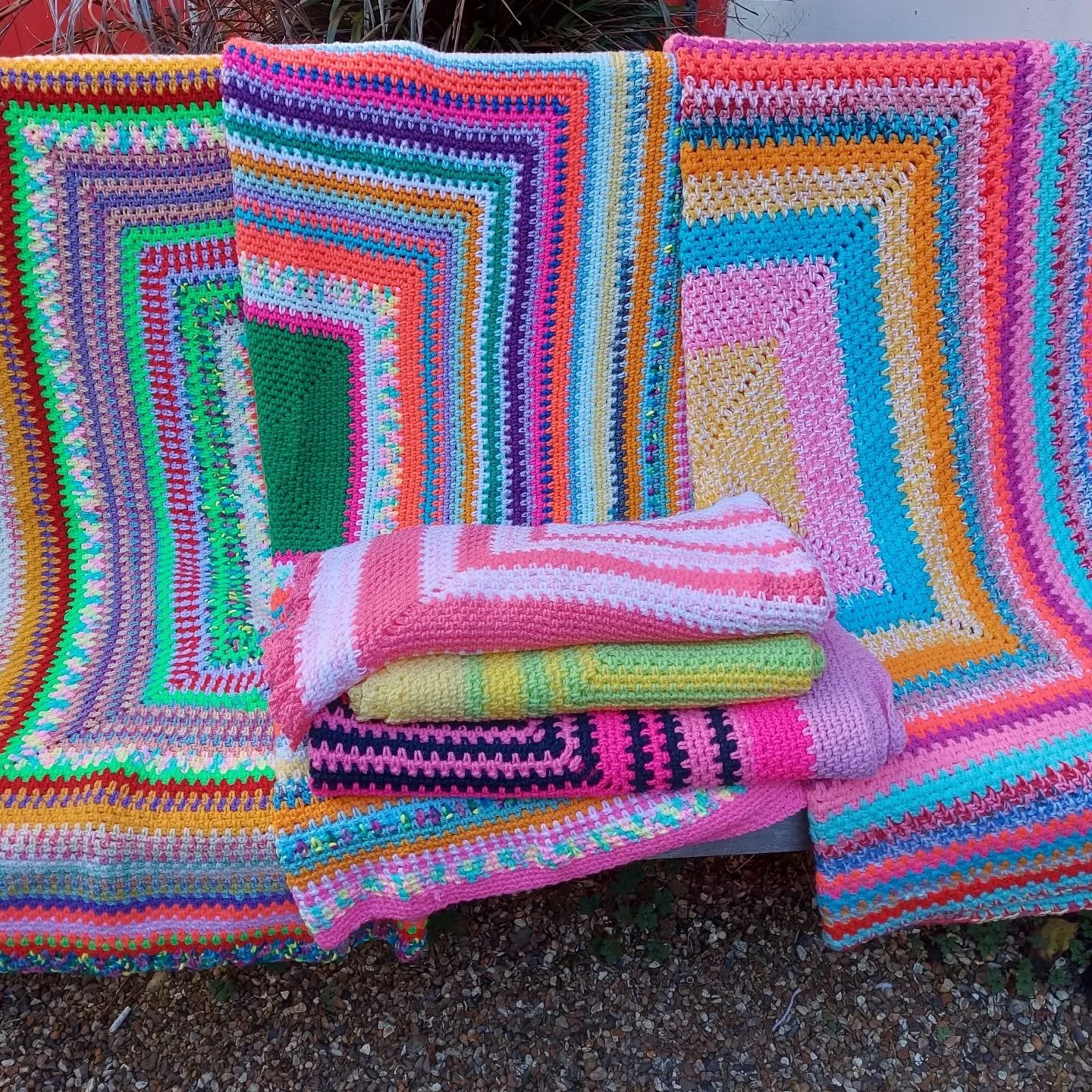 B in Banff has sent us this joyous collection of blankets. We love all the bright colours which made us all smile when we opened the parcel....and you already know how much we like a Granny Square!

Thank you, B. These are our Crochet of the Day!

#c