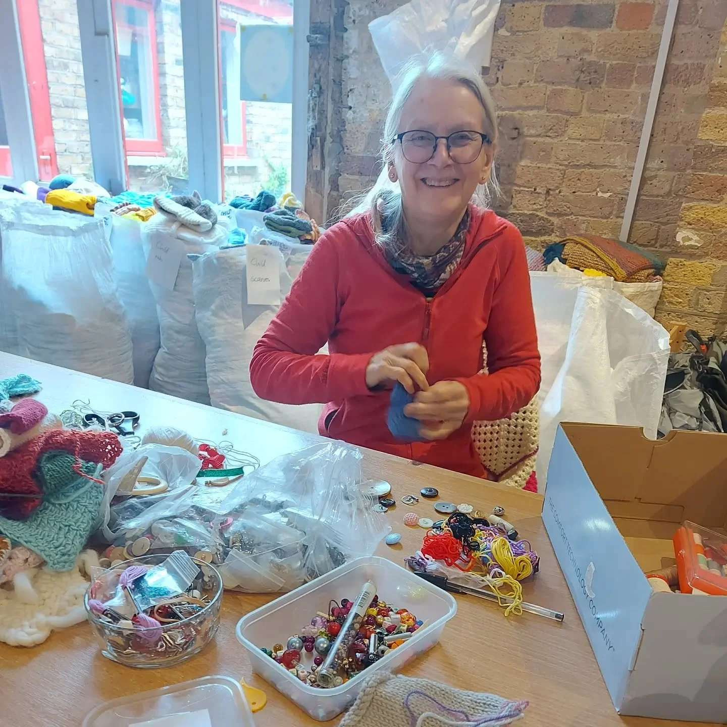 Hazel, our good friend and former volunteer, came to visit last week.  Happy to help out, as always, as well as opening some mail and packing some boxes, she also spent some time raiding our collection of notions to add twiddle to some unfinished twi
