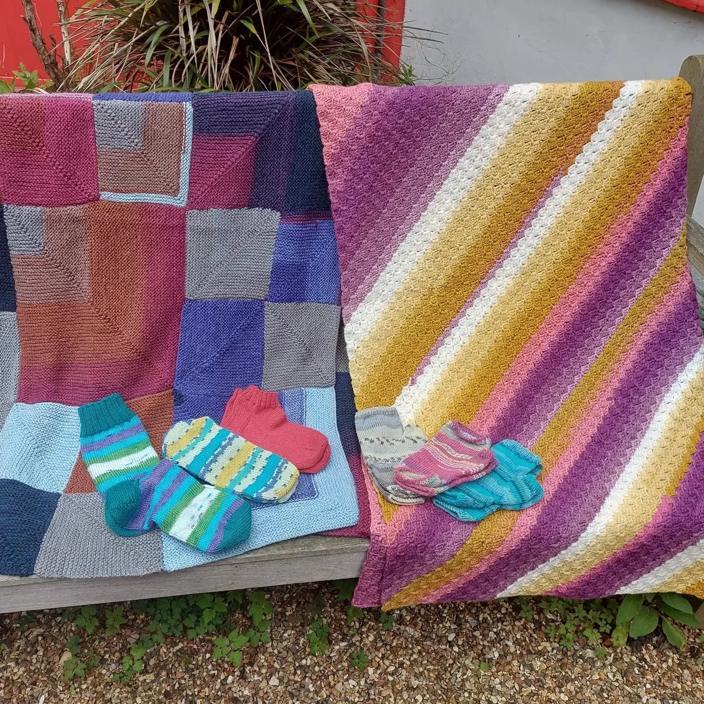 A Crafter in Worcester has sent us these terrific blankets, socks and mitts. We do love a stripe here at KFP HQ.  We're also intrigued by the blanket incorporating different sizes of mitred squares - that takes a bit of planning!

Thank you, Worceste