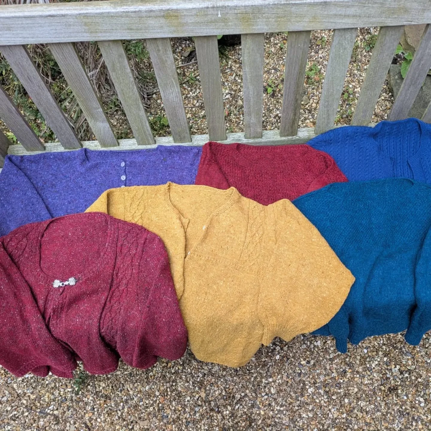 Sometimes, we battle the elements in the interests of photography 😁. It was a breezy day, and these gorgeous jumpers and cardigans would simply not lie still. 

They were sent to us by Patricia in Surbiton, and if you look closely, you'll see some b