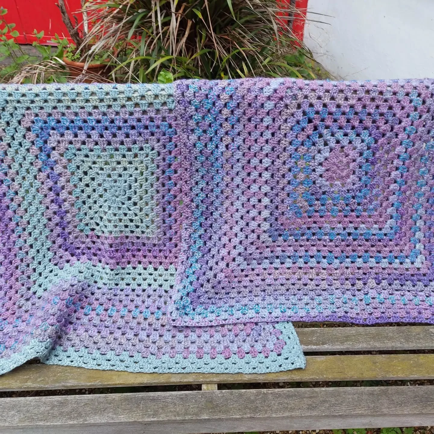 Sometimes the simplest of construction, made in complementary colours, is all that's needed to make something cosy and appealing.  Large granny squares drape softly over shoulders or knees, and hand-made, they are a generous gift. 

These have been s