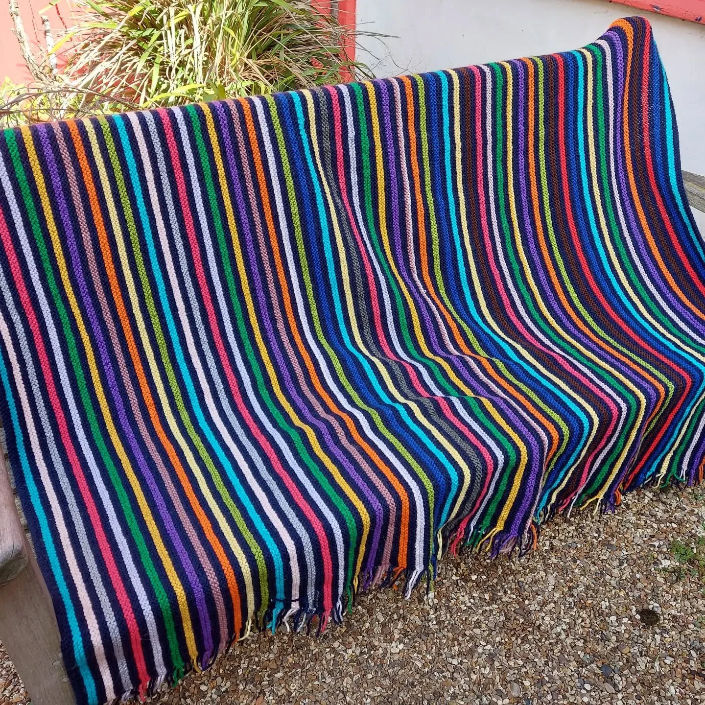 Sally in Tonbridge has sent us this magnificent stripy blanket.  It is made from such a great range of colours and such neat garter stitch. It must have been so warm and cosy making it and will be a woolly warm hug for someone. 

Thank you, Sally. Th