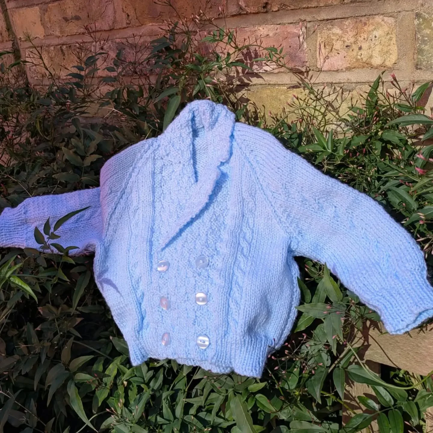 Cynthia in the Wirral has sent us this cute little jacket.  In her letter, she told us that an item in our newsletter had sparked a memory of a knitting pattern she had used many times 50+ years ago.  Wondering if she still had the pattern, she asked