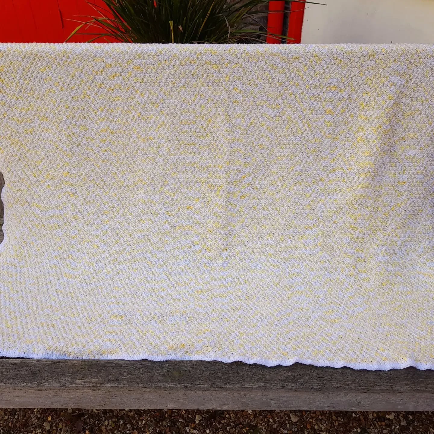 Teresa in Eastbourne has sent us this huge blanket.  Look closely, and you'll see the subtle shifts in colour as well as the regular stitch pattern.  There's even a crocheted edging.  It must have taken hours to make. This will be perfect as a cover 