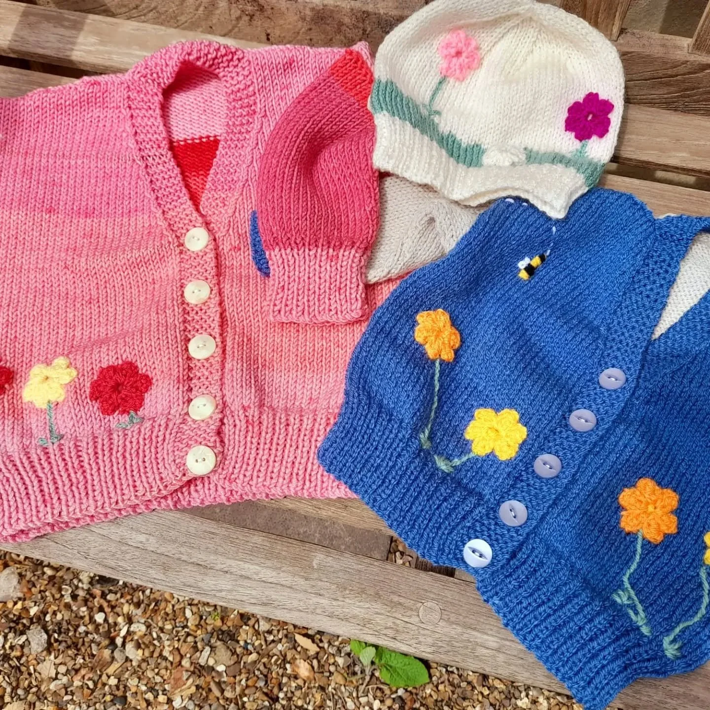 Sheila in Criccieth has sent us these delightful flowery cardigans and hat.  They made us all smile when we opened the parcel.

In her note, Sheila said that she sees our posts on instagram, and they are always interesting.  Thank you, Sheila!  It's 