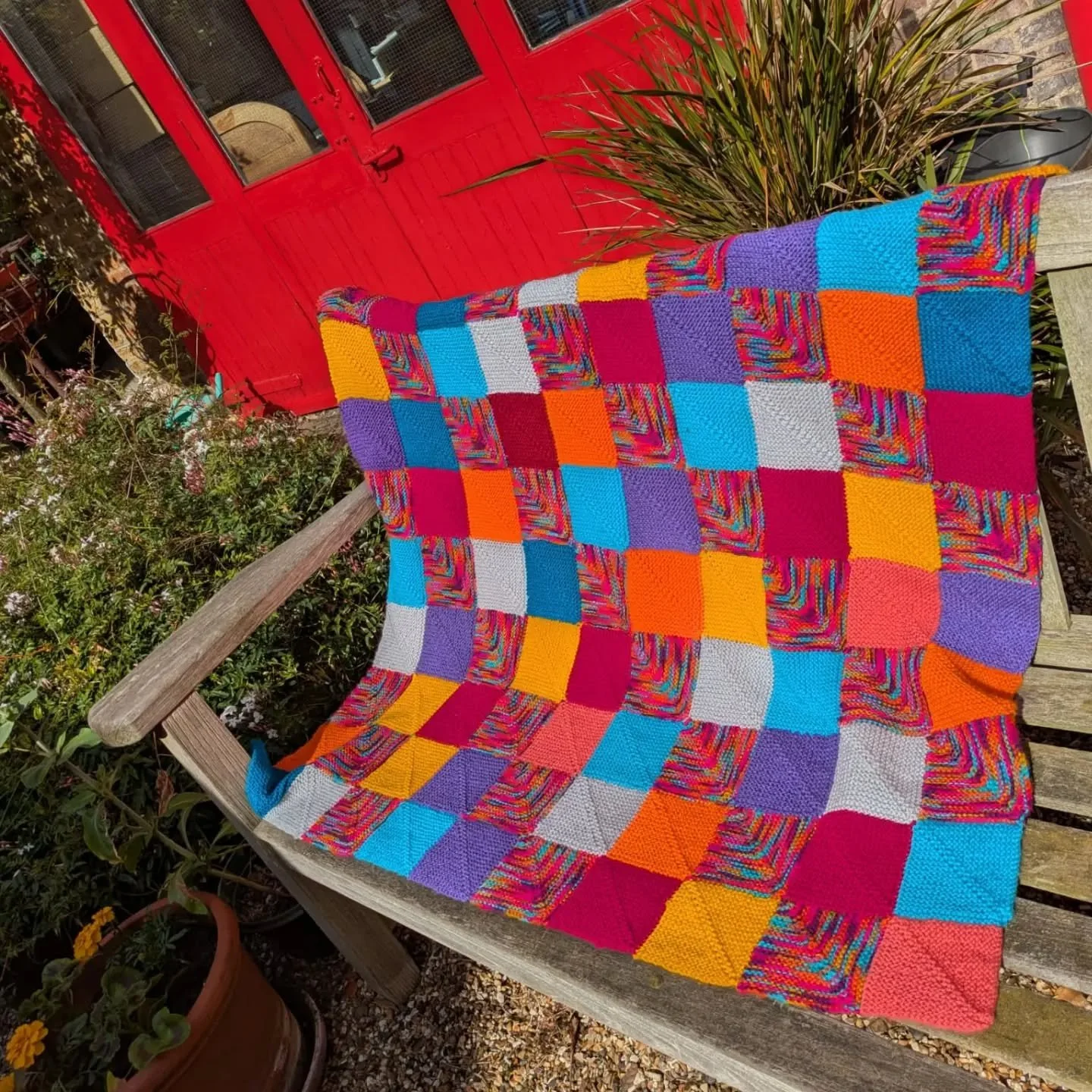 Sue in Norfolk has sent us this great blanket.  We love the warm colours which will remind us of sunny, warm days when times grow cooler.  And it's our favourite mitred square design!

Thank you, Sue.  This is our Knit of the Day!

#knitoftheday #han