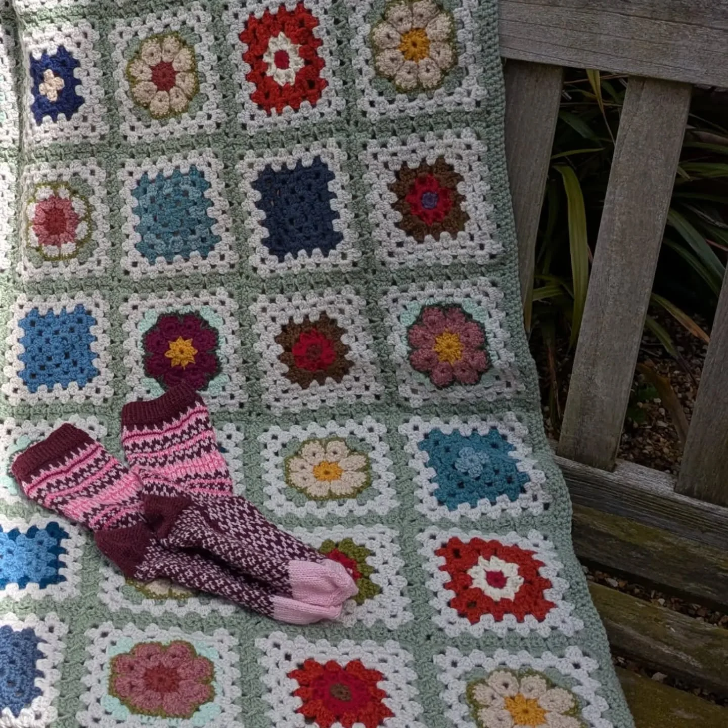 Eli in Wallasey sent us these lovely colourful things.  We do love seeing all the variety it's possible to achieve with the granny square, and here the blanket design is brought together by the white and green border to each square, while also having