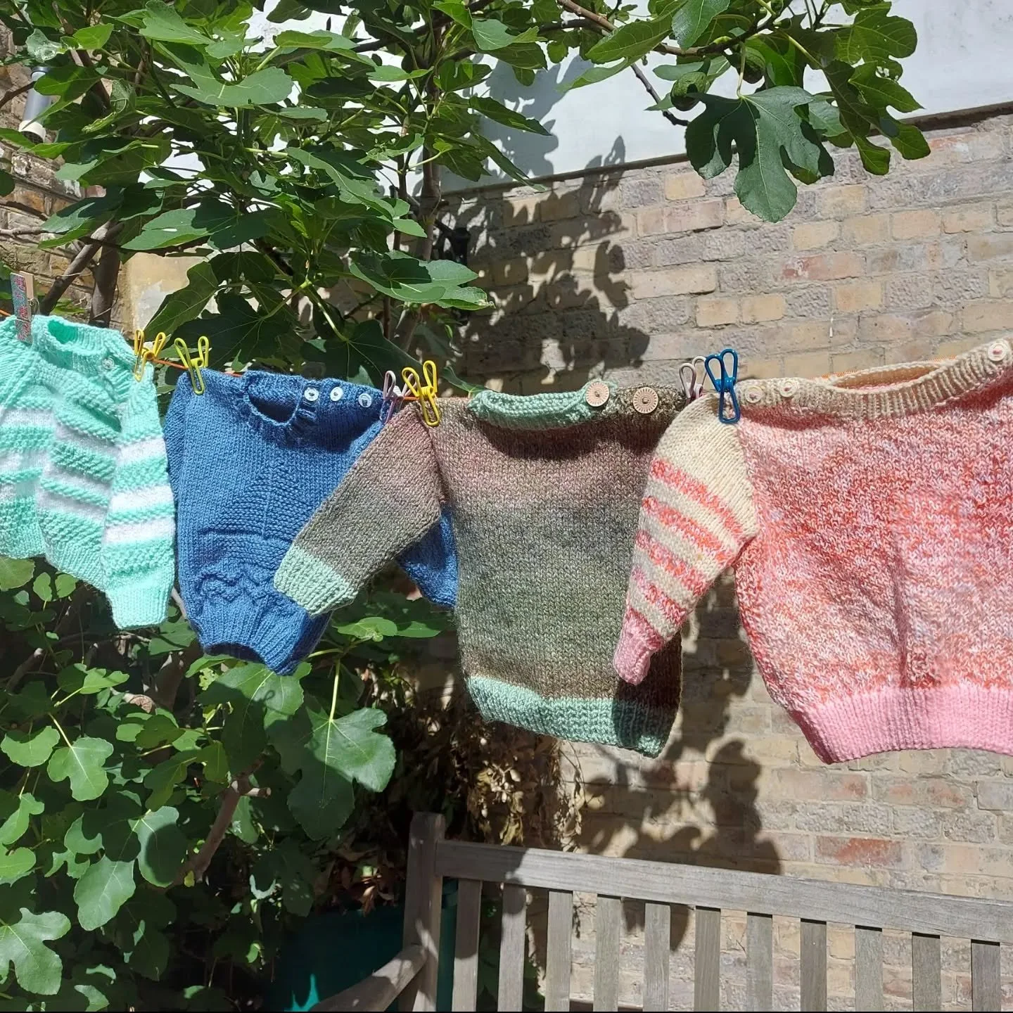 Yvonne in Woodbridge sent us a delightful batch of jumpers. In her note, she says that they were made largely from yarn from one of our Stashbuster boxes. We love hearing about the great things people have made from leftovers and bits and pieces. 

T