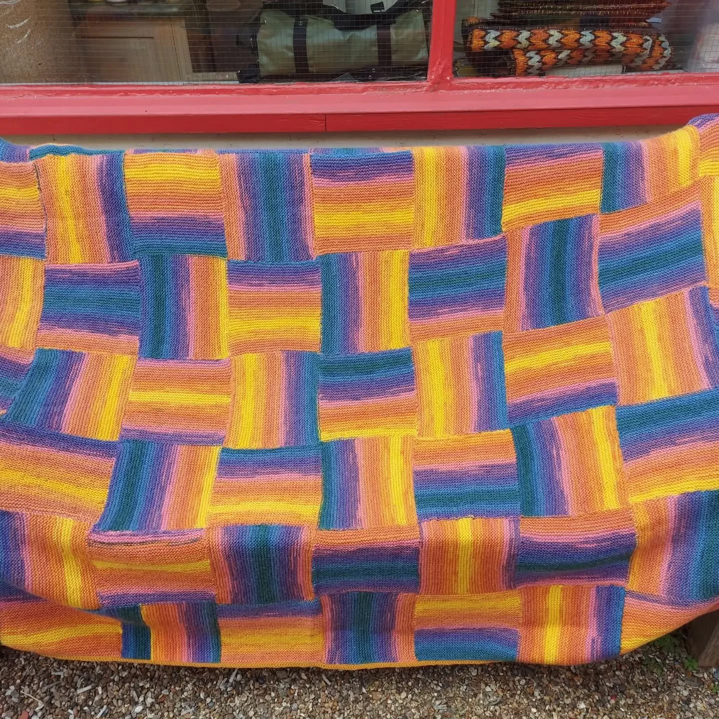 This magnificent blanket was sent to us anonymously. It is a masterwork in using self striping yarn to maximum pleasing effect. 

Thank you, Knitters and Crocheters. This is our Knit of the Day. 

We are often asked what we are in need of.  At the mo