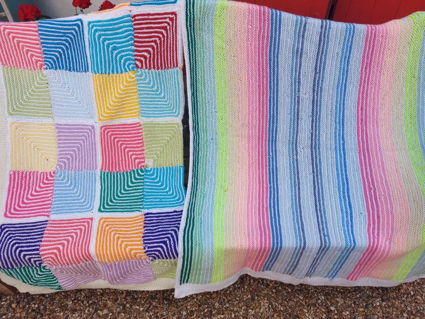 Margaret in Finedon has sent us these brilliant blankets. We really enjoyed seeing the different effects it's possible to create using similar techniques.  The blanket on the left is our favourite mitred square with alternating rows of colour, with a