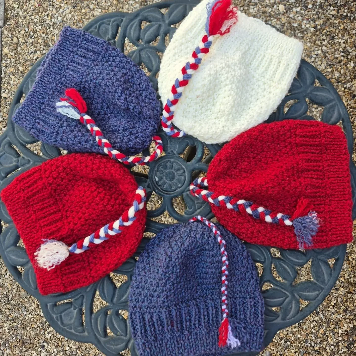 These colourful hats have been sent to us by Maggie in Sturminster Newton.  We love the plaited details, setting them apart from the crowd. 

Thank you, Maggie. These are our Knit of the Day. 

#knitoftheday #handknitting #knittingforothers #charity 