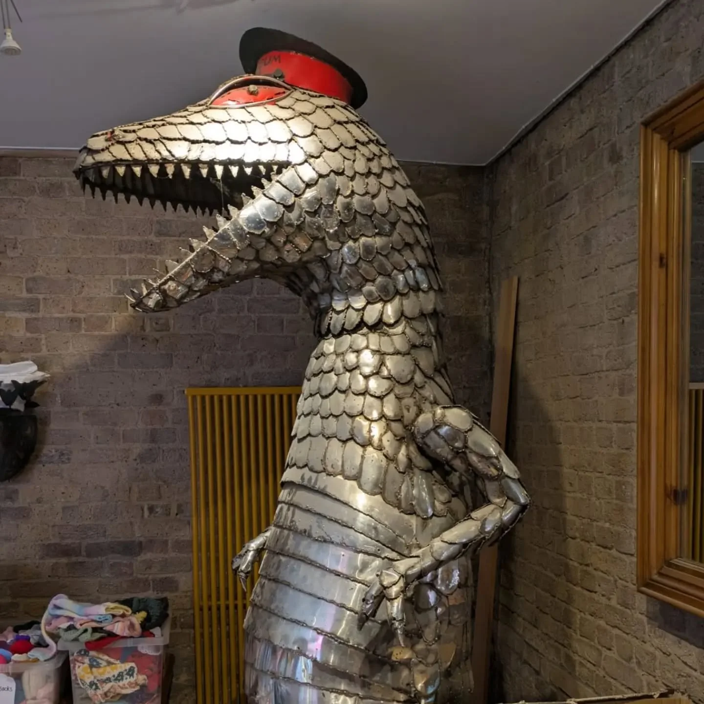 We've more information about Dan the Dinosaur! 

He has kept guard over our knitting room for many years, after long service at the Museum Shop.  Until now, we didn't know anything about his provenance, but a recent chance discovery has opened up inf