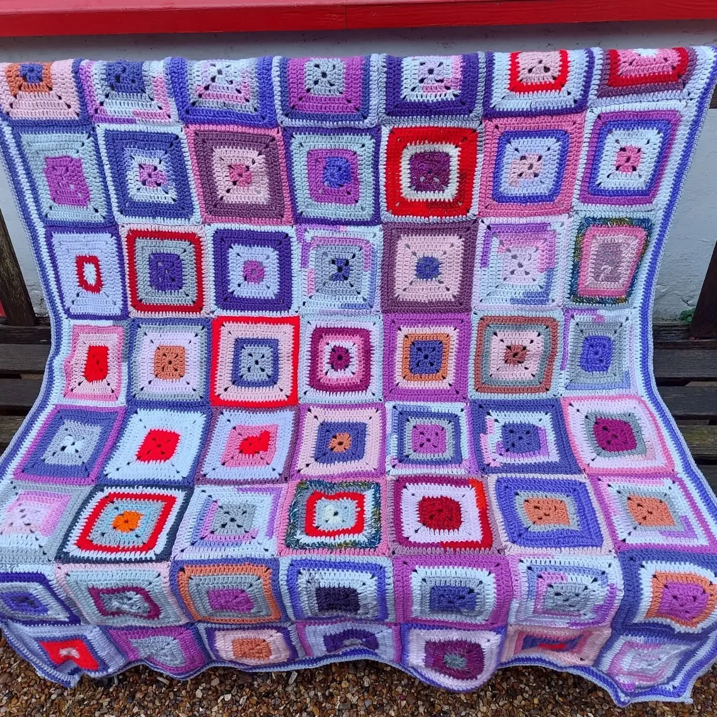 Catherine, a long-time supporter, has sent us this magnificent blanket. We love the complementary colours and their arrangement. This looks like a brilliant use of lots of leftover yarns and a great stashbuster project. It will bring warmth and brigh