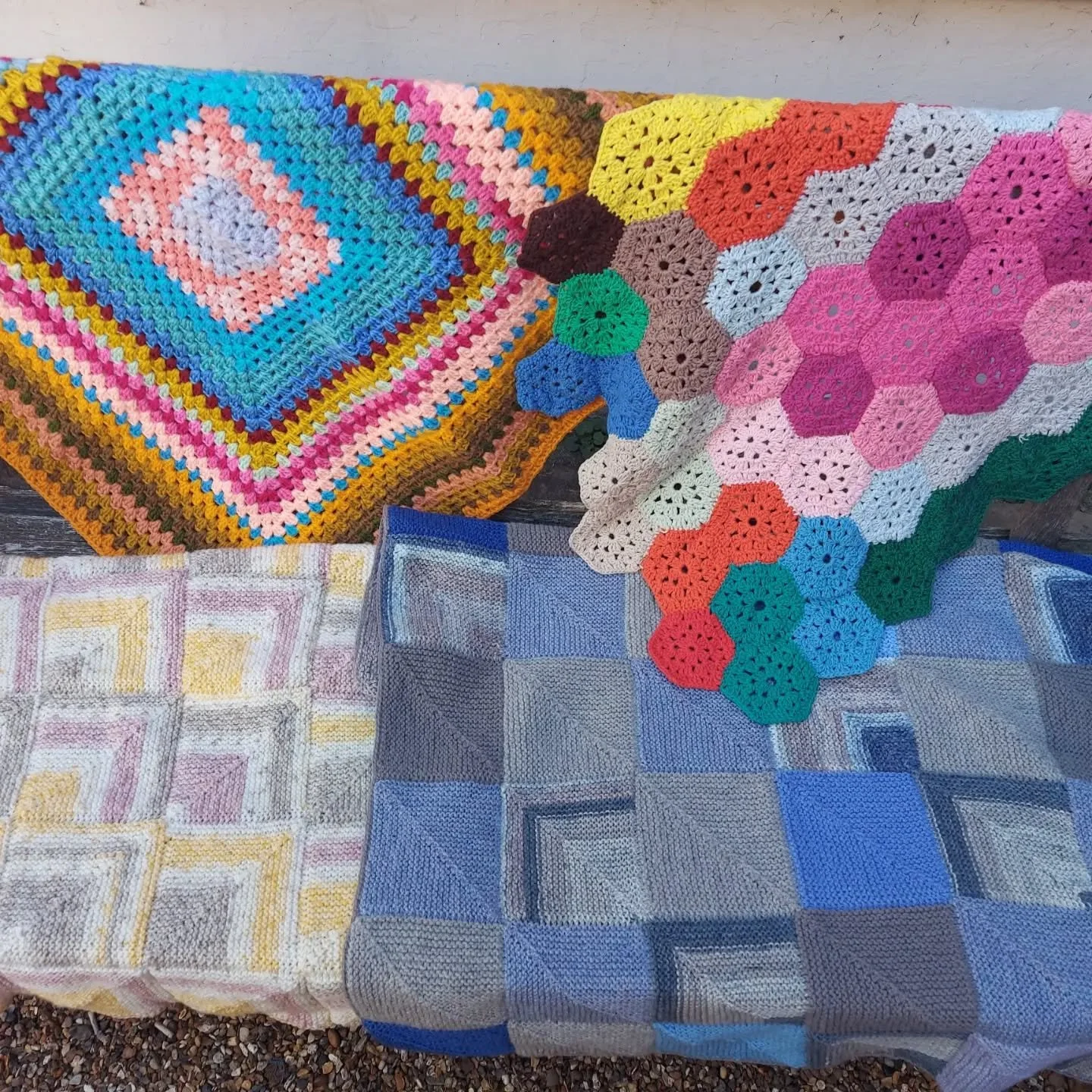 St Michael's Church Knit and Natter group, Tilehurst sent us a bounteous bundle of yarny warmth. We love the variety of colours and techniques.  We always enjoy seeing mitred squares and variations of crocheted granny squares...... such a collection 