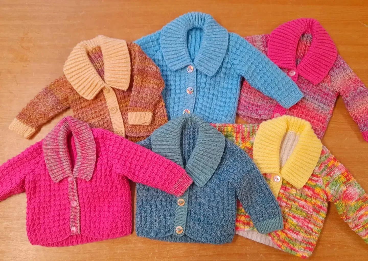 Who doesn't love a colourful cardigan with a collar?  These are just perfect for a small baby, and are much needed at the moment. 

Karen in Stevenage has sent them to us, saying that there might have been more had she not just received the joyful ne