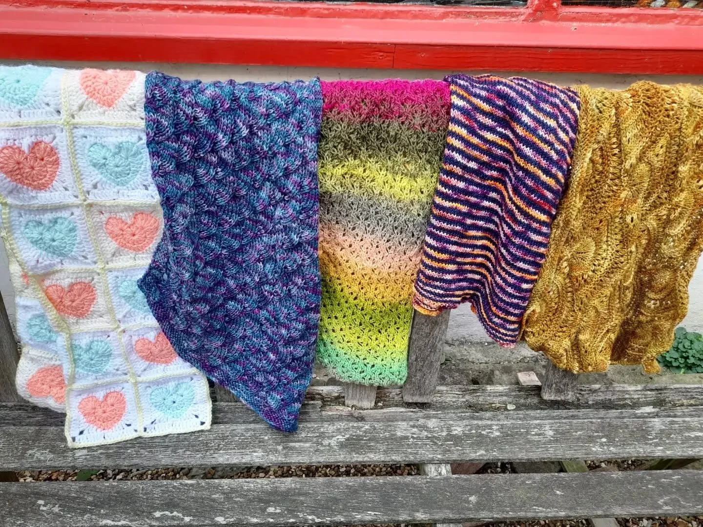 Hannah and Izzy in County Durham sent us this lovely collection of scarves. They told us that Izzy made the heart scarf as part of her Duke of Edinburgh award activities. This encouraged Hannah to go through her stash of yarn to make the colourful sc