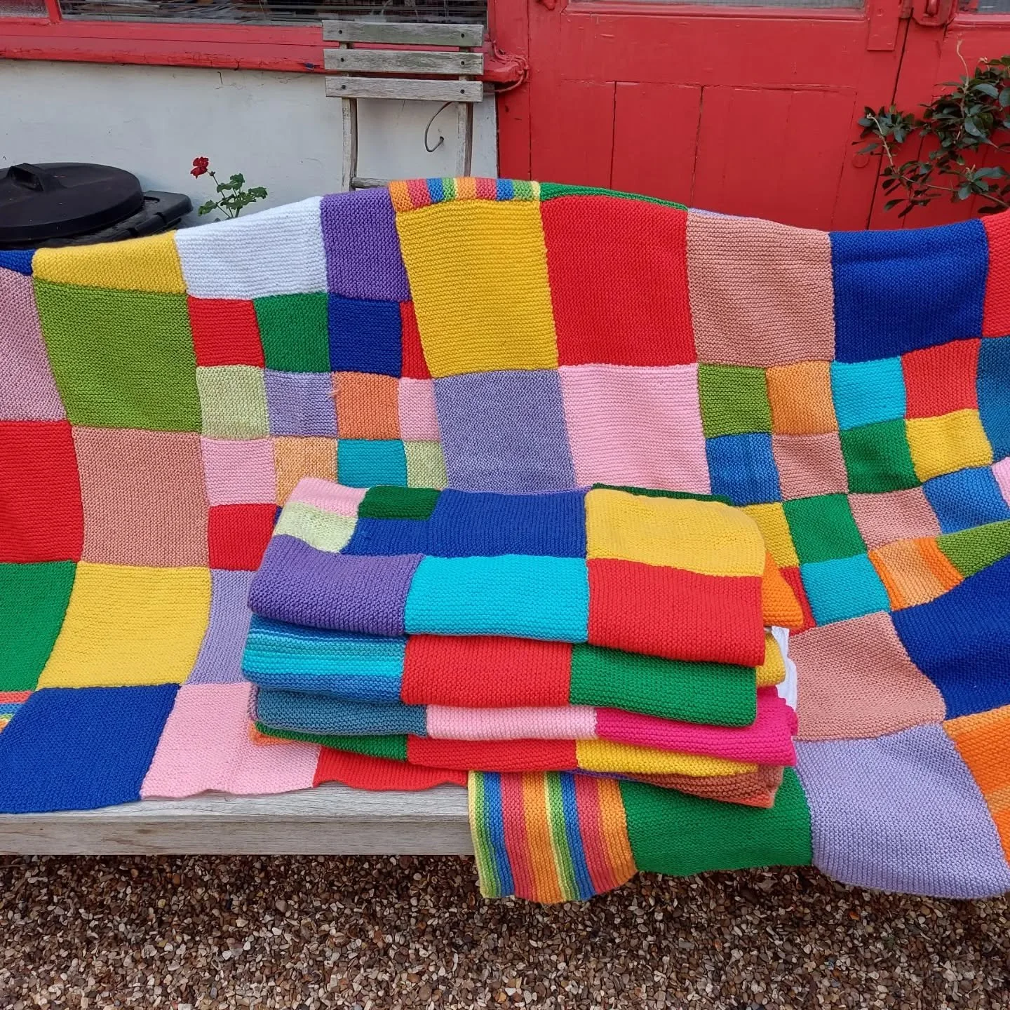 Jane in Barnet sent us this stack of magnificently colourful blankets. We love the way she has incorporated squares of different sizes, as well as using the occasional stripe. 

Thank you, Jane. These are our Knit of the Day!

#knitoftheday #handknit