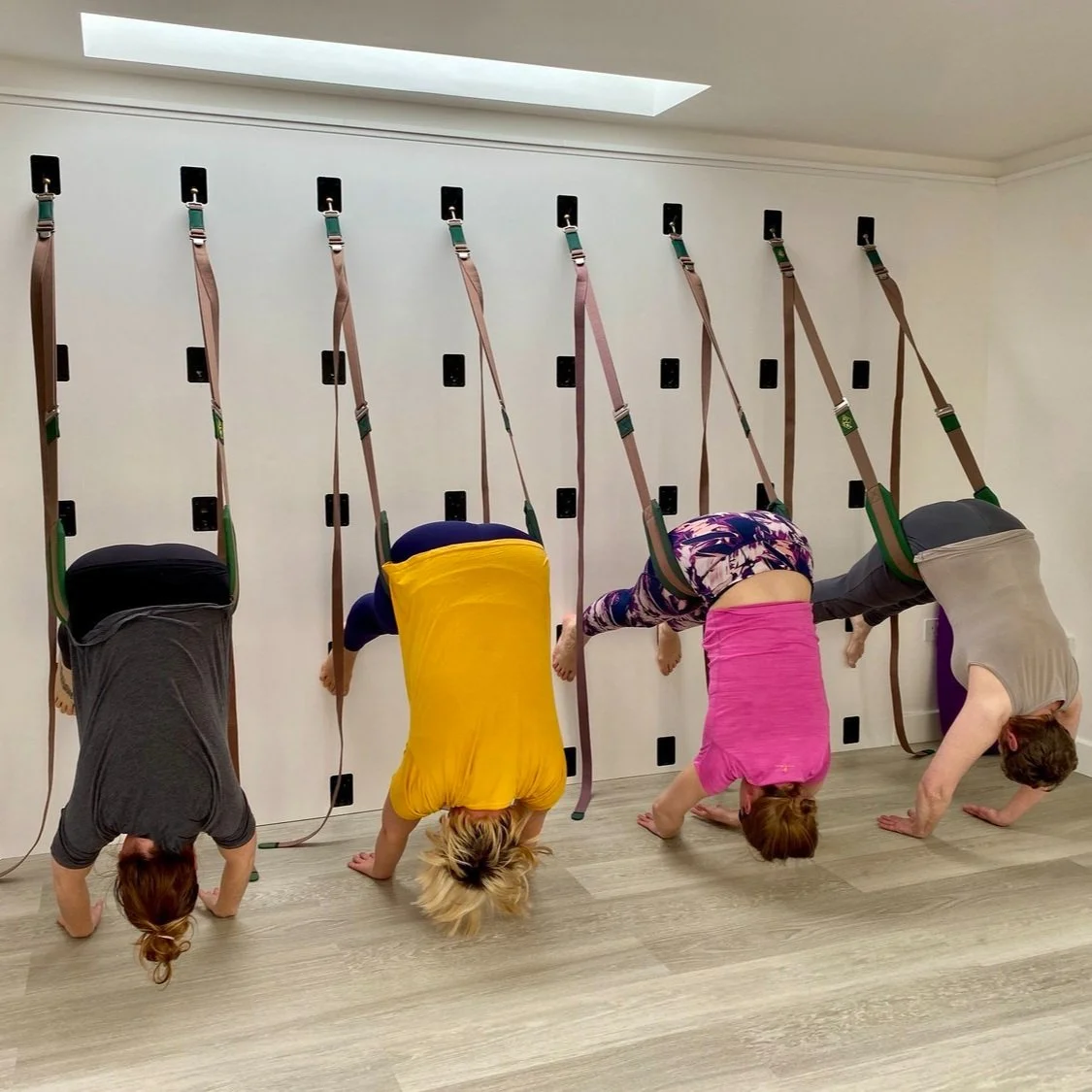 Wall rope yoga group class