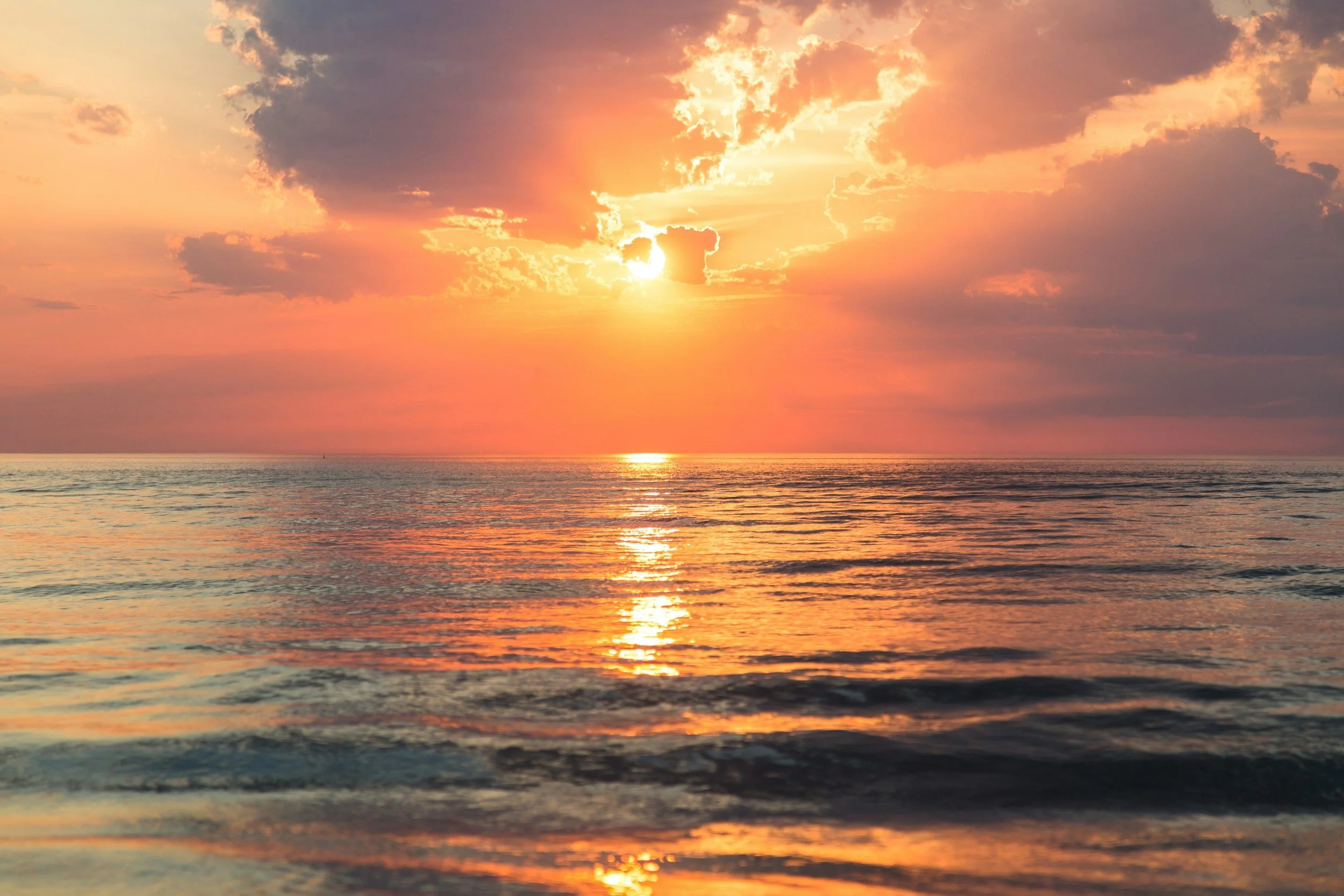 Why do people take more pictures of sunsets than sunrises?