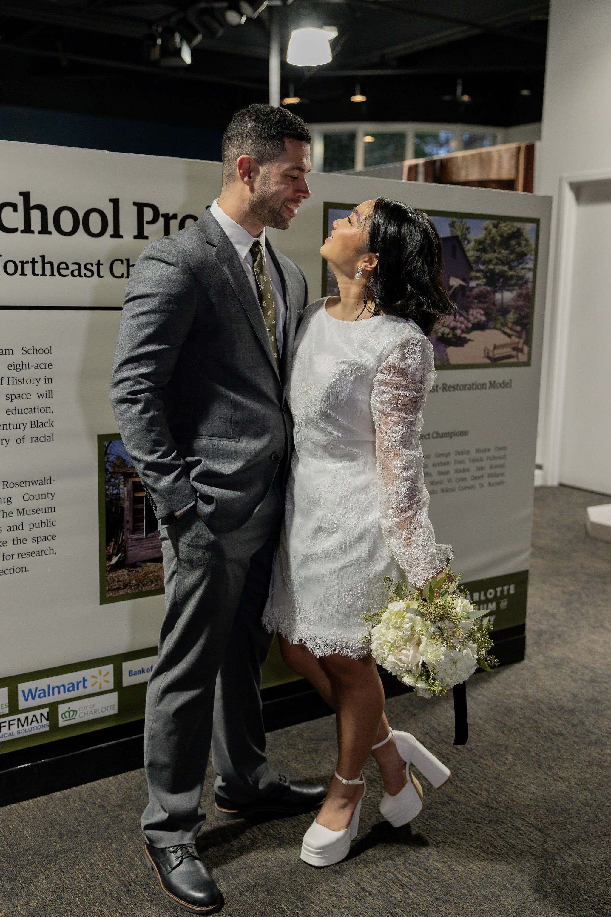 Bride and groom in a museum wedding designed by a Charlotte wedding planner