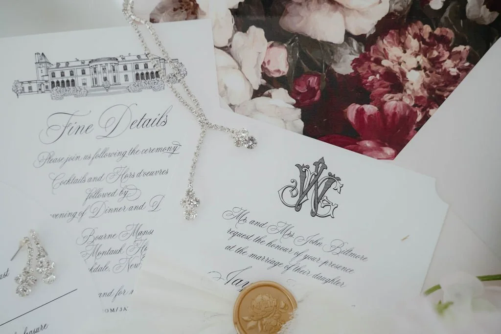 Wedding invitation suite with elegant black and white design, a monogram 