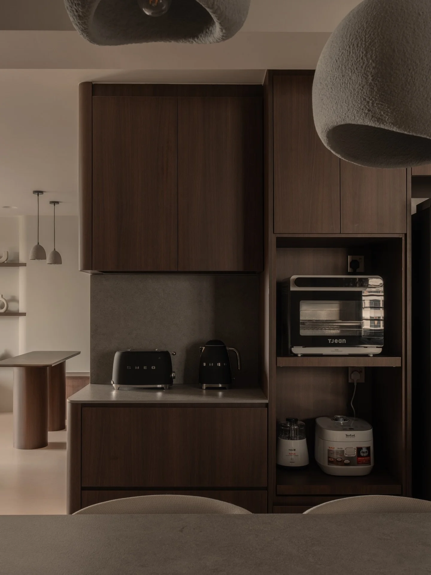 POV: You finally have the kitchen island you have been saving on Pinterest for years.

This central hub was built for more than just prep; it is where morning coffee and evening conversations happen.

Every appliance has its place in custom-built nic