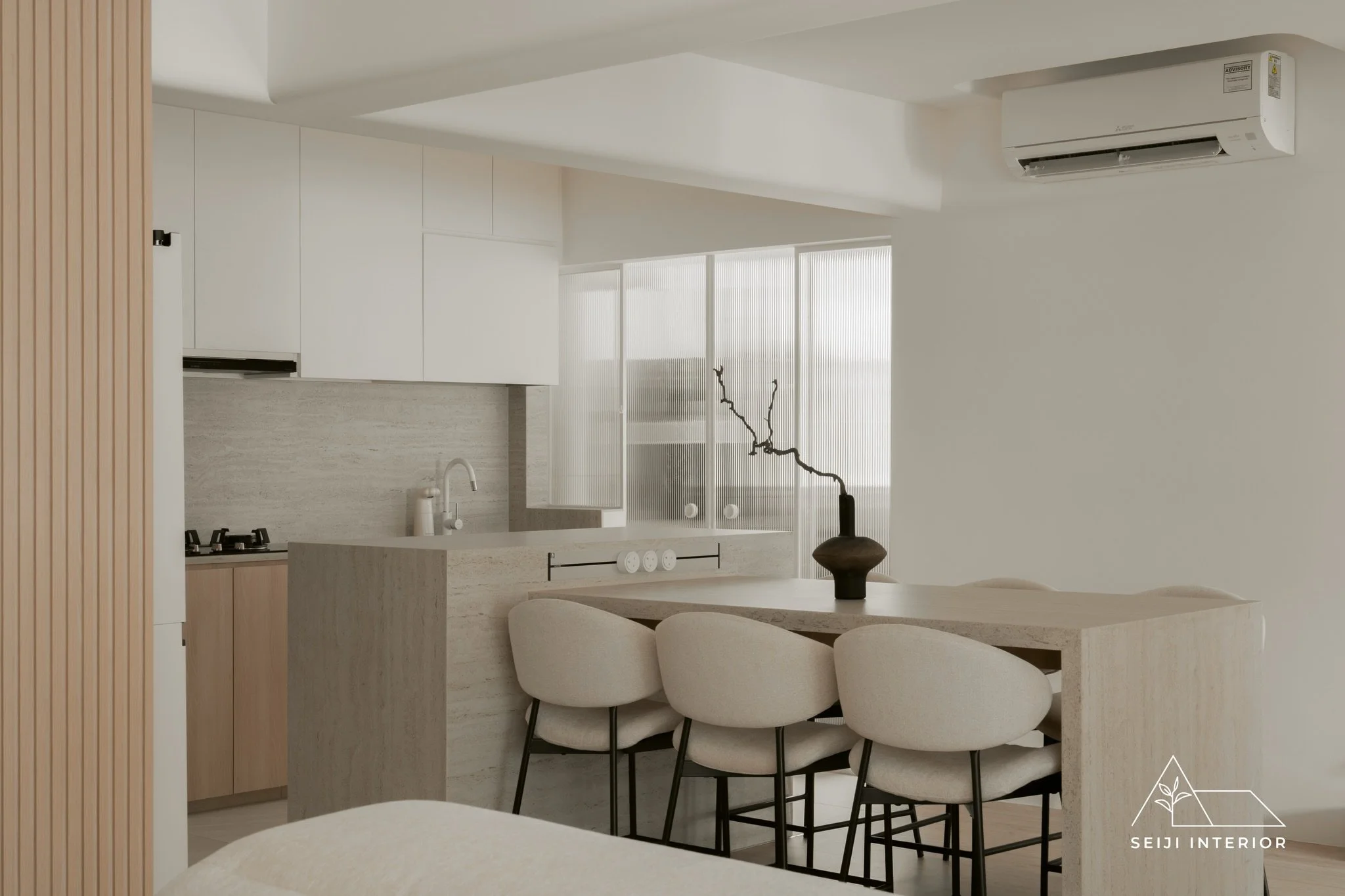 Fluidity is everything in a 5-room resale. We designed an extended built-in fabricated island that flows directly into the dining table, maximizing both prep space and connection.

Project: 997B BUANGKOK
Style: MINIMALIST JAPANDI
Type: 5RM RESALE BTO