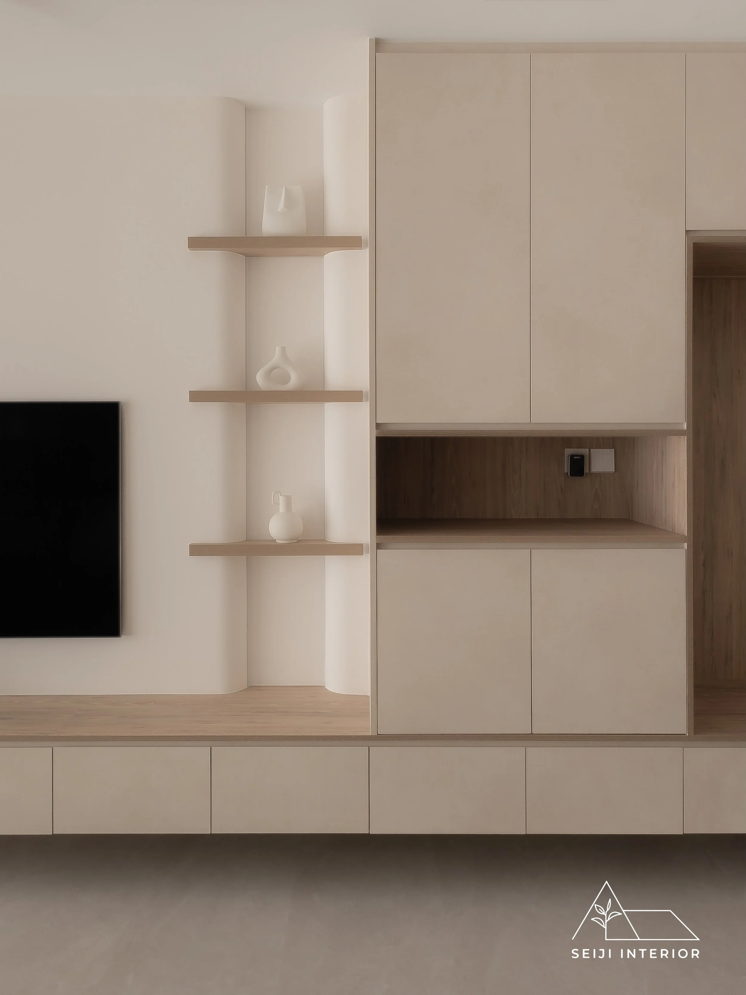 A living room built for a family to actually live in. Soft tones, warm wood, and shelving that makes space for everyone's things without the space ever feeling full.

Project: 338A Anchorvale
Style: Minimalist
Type: 5RM Resale HDB