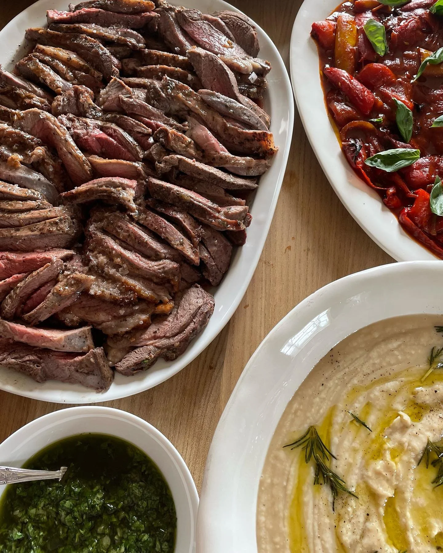 A special birthday lunch today!! 

Butterflied leg of lamb marinated in mint syrup, rosemary &amp; olive oil cannellini bean mash, roasted balsamic peppers, broad bean, pea, mint and feta salad &amp; chimichurri sauce.