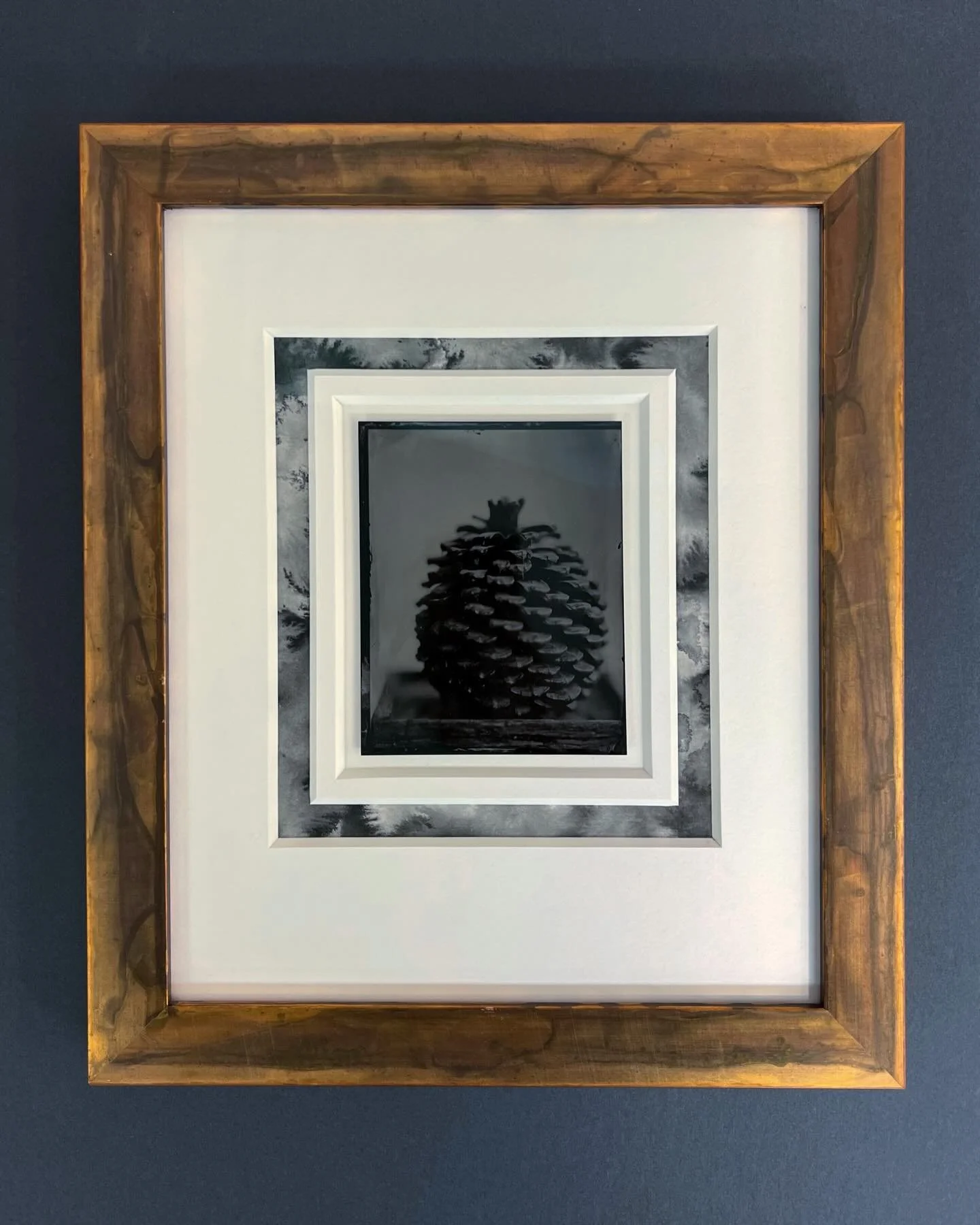 Gosh, we love this one! Contemporary tintype floating within an 8ply open v-groove rag mat with a watercolor ink &ldquo;reveal&rdquo;. Copper colored @bellamoulding takes it from monochrome to warm and glittering.