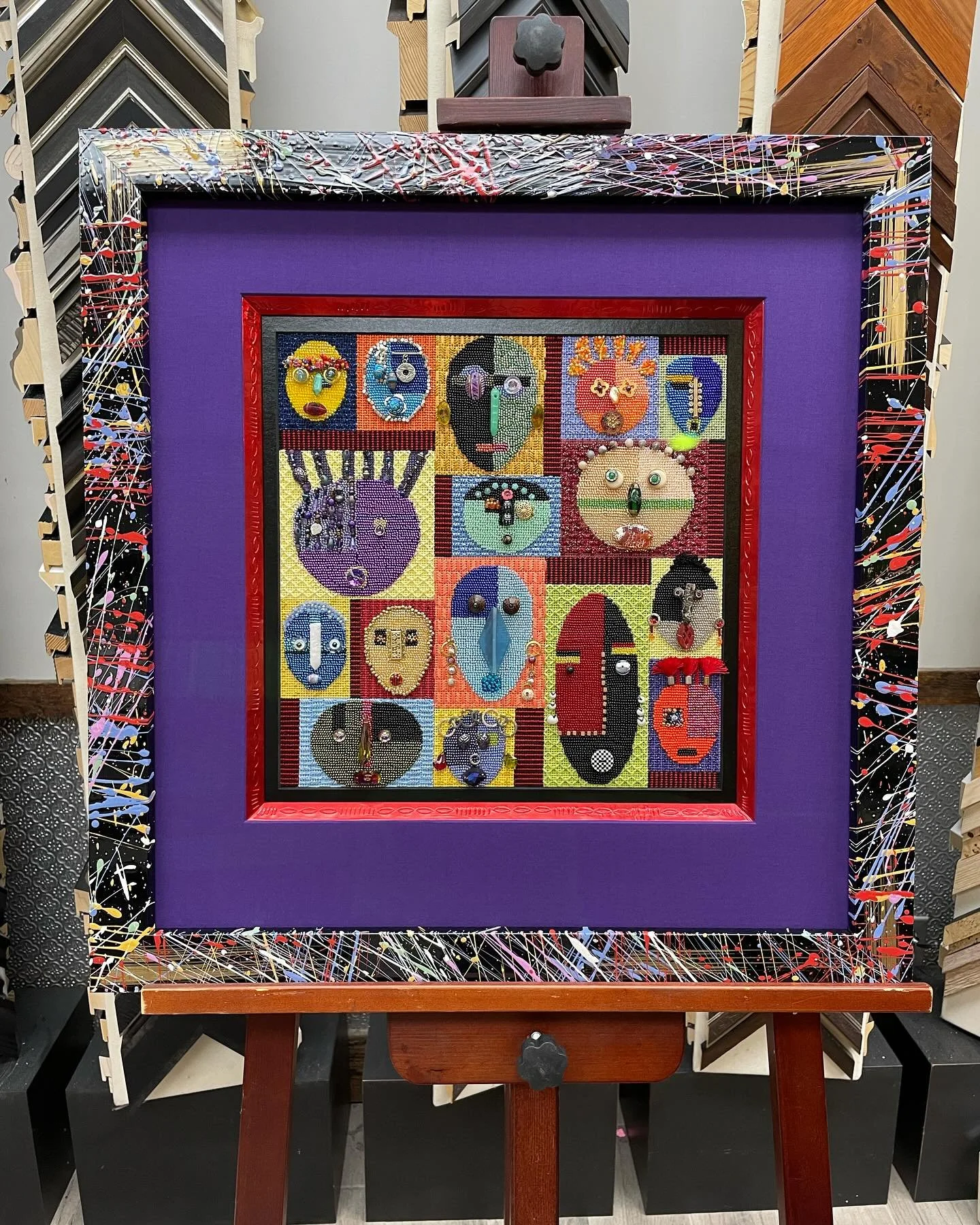 Look close at all the details! Creativity galore!  Complimenting this intricate needleart is the Vola frame line, so much color and playfulness. Nancy added a liner of red stamped anodized aluminum to complete the look. @romamoulding #needleart #need