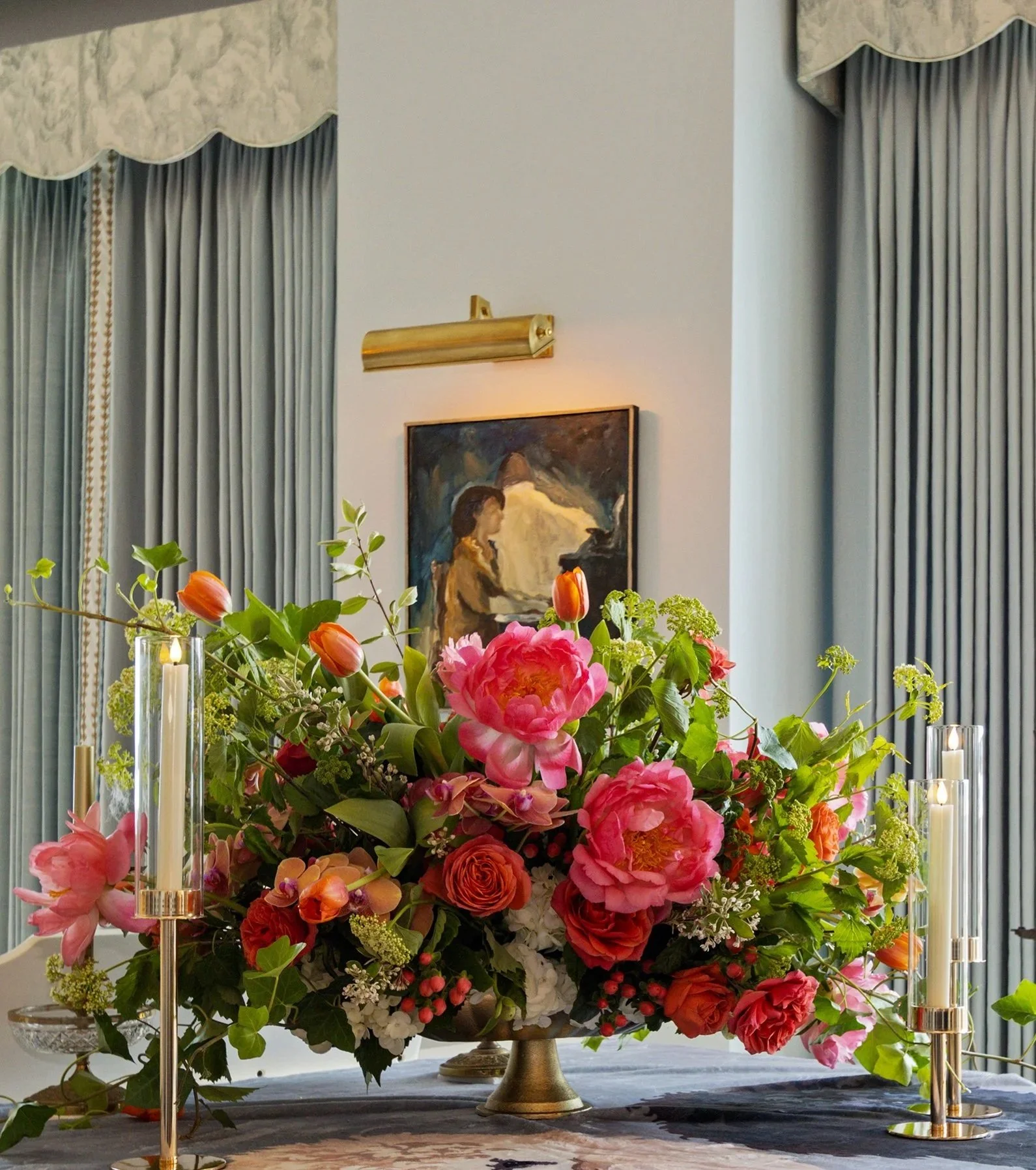 Elegant coffee table vignette featuring seasonal blooms and layered textures-North Texas Home Staging Merriment by Design