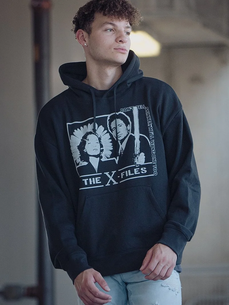 This hoodie takes a playful take on a staple of 90s TV, the X-Files.