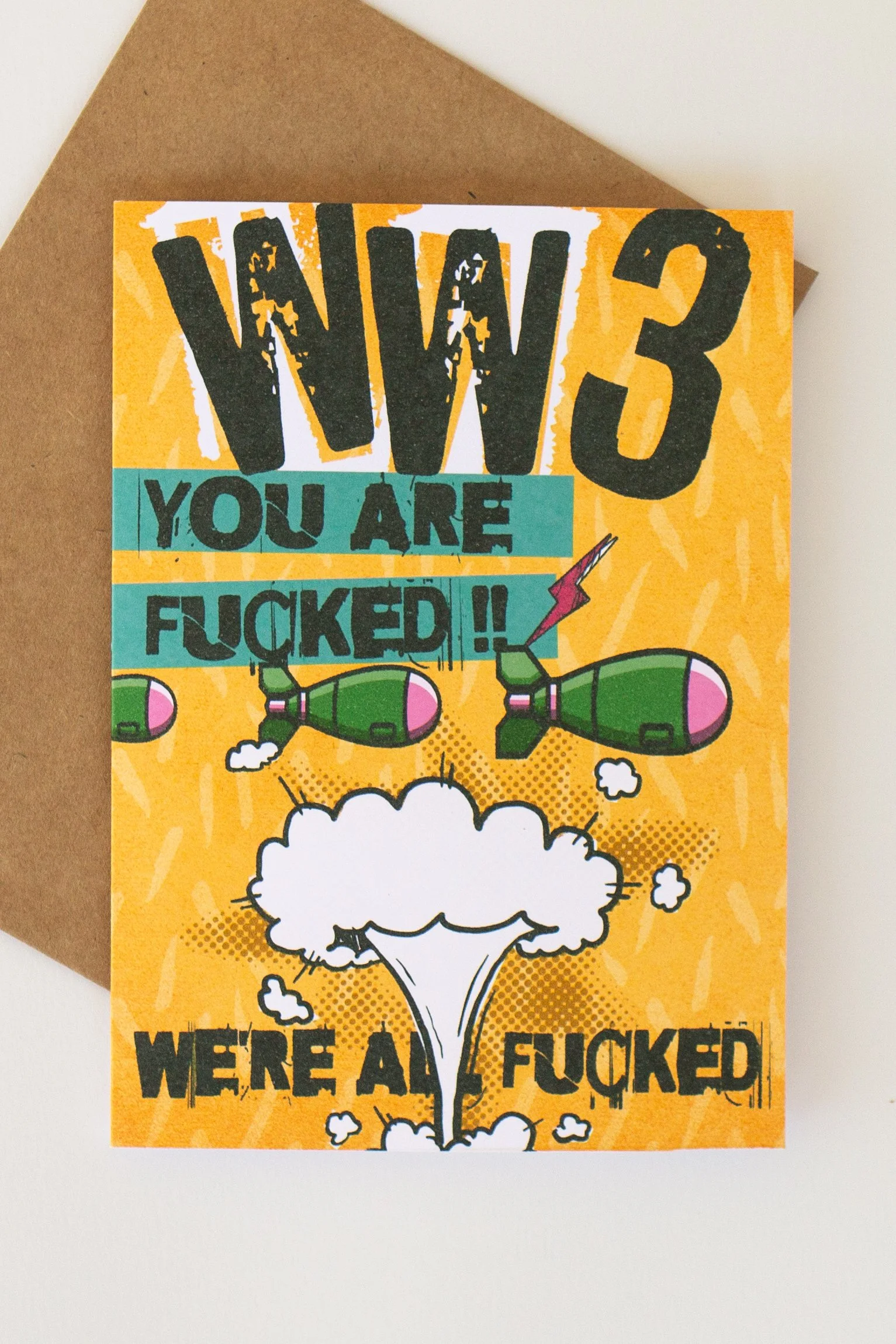 This comic-style bombs & mushroom cloud humor card is available wholesale - perfect for when life feels apocalyptic.