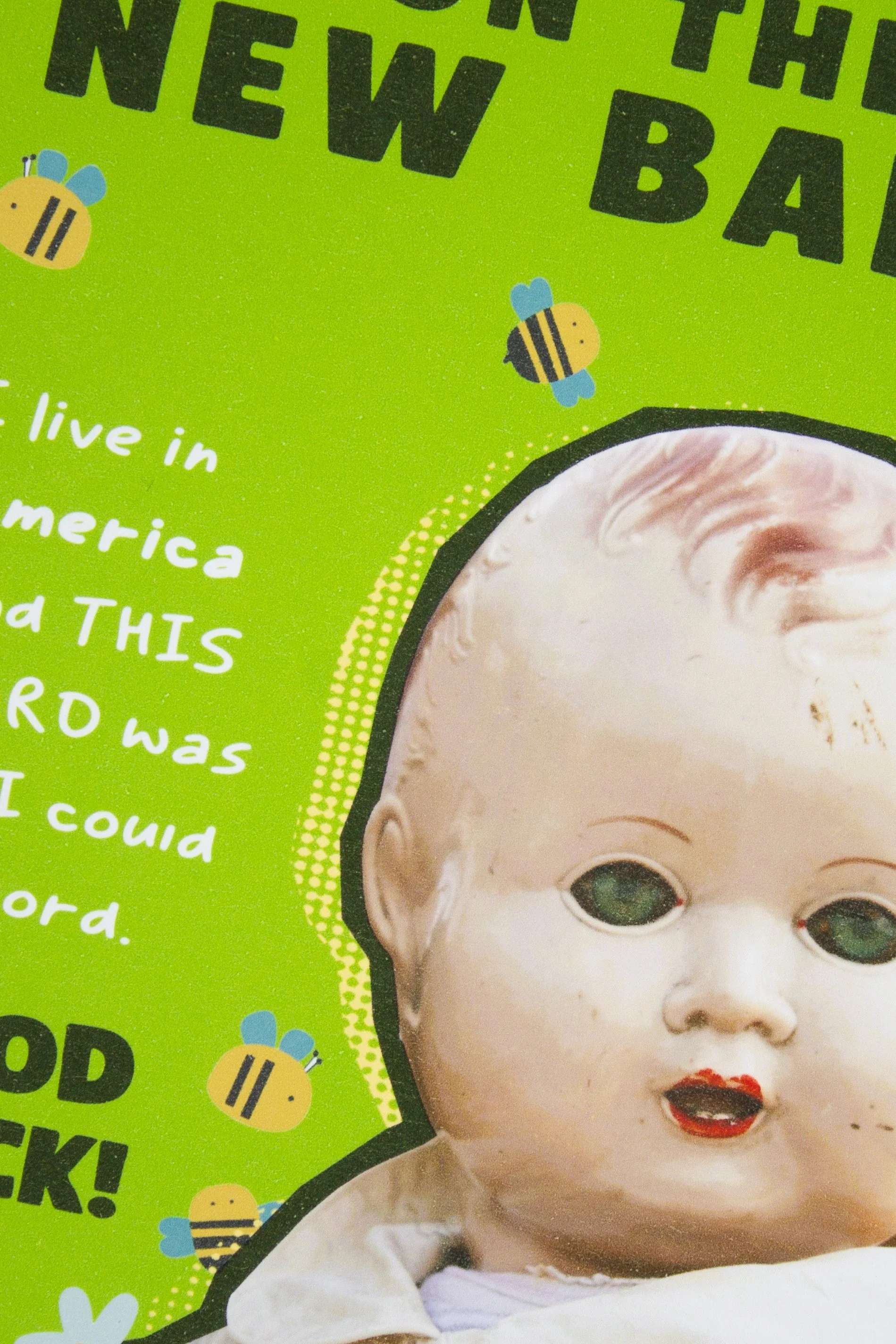 unique baby shower card featuring a delightfully creepy vintage baby doll