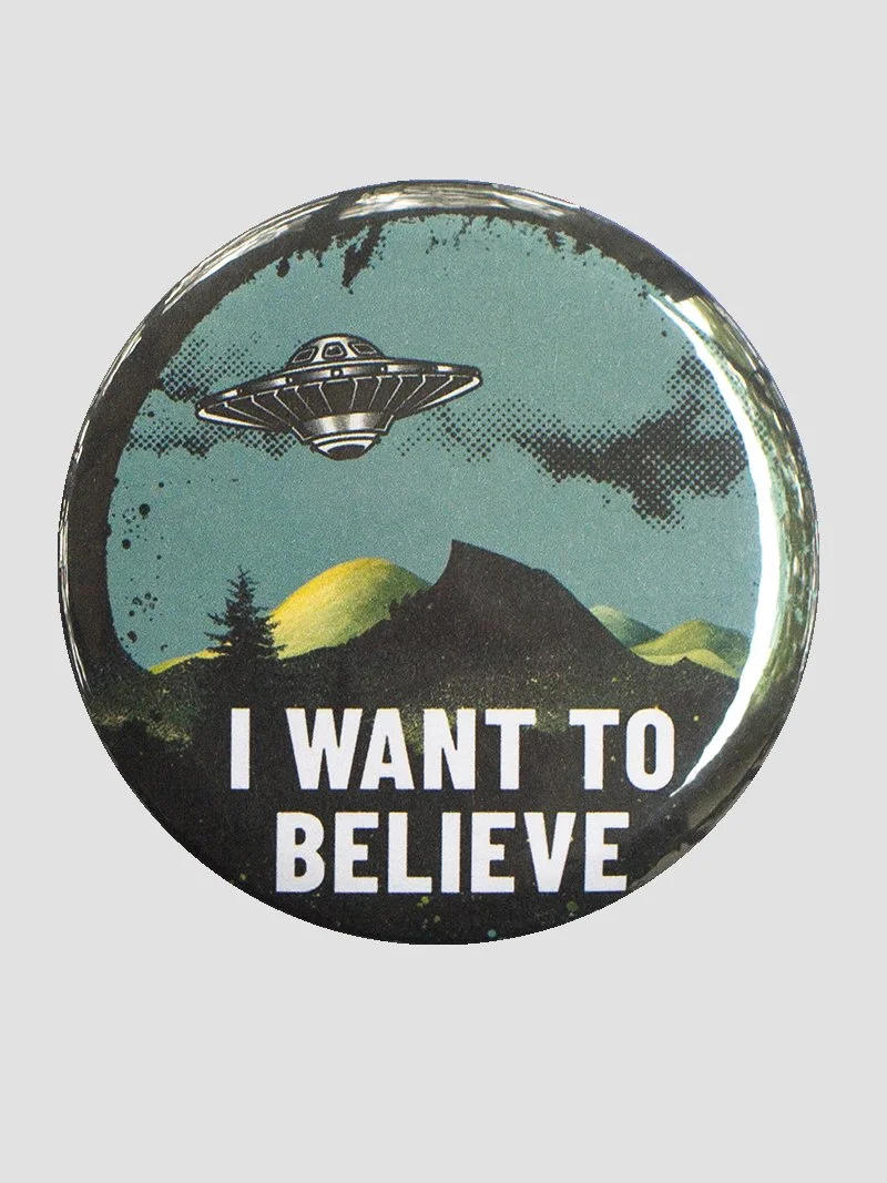 Pin on the nostalgia. A 90s-inspired alien button for your backpack, jacket, or tote.
