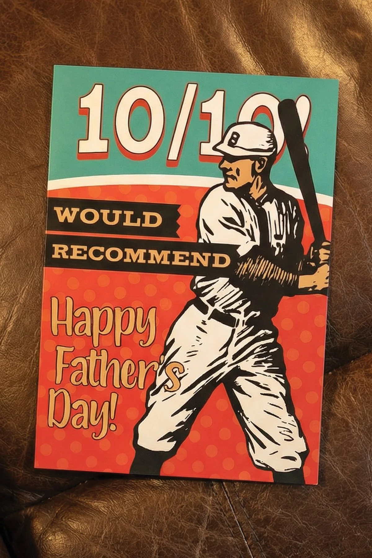 Tell your baseball loving fan dad Happy Father’s Day with this light-hearted and sarcastic red and teal card.