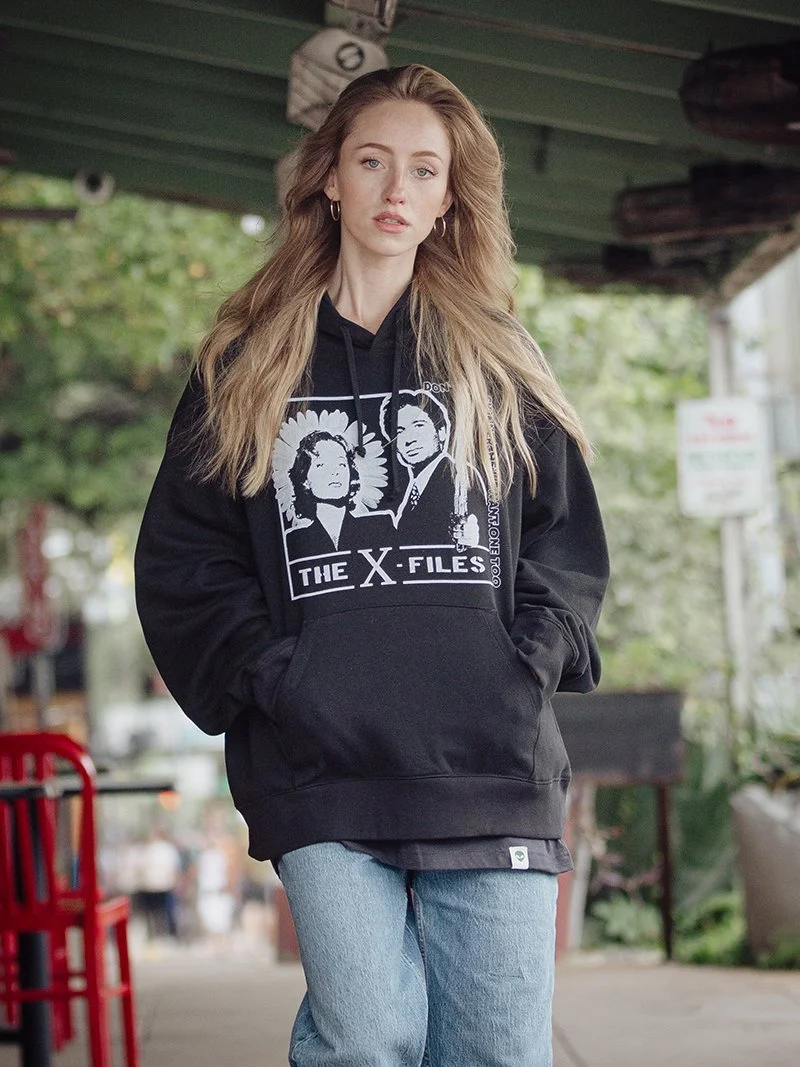 This hoodie takes a playful take on a staple of 90s TV, the X-Files.